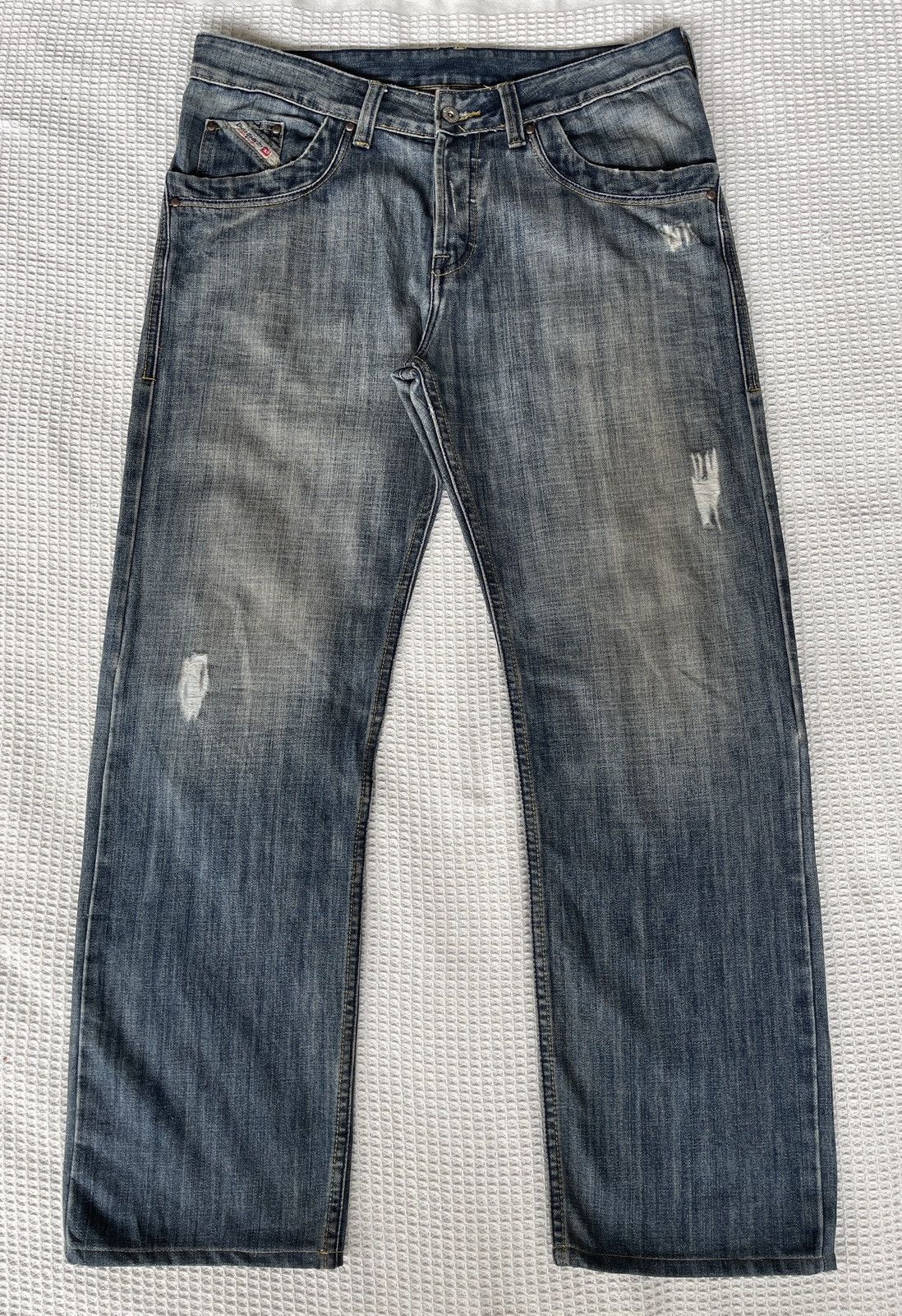 image of Vintagedieseldistressed Baggy Denim Jeans in Light Blue Wash, Men's (Size 35)