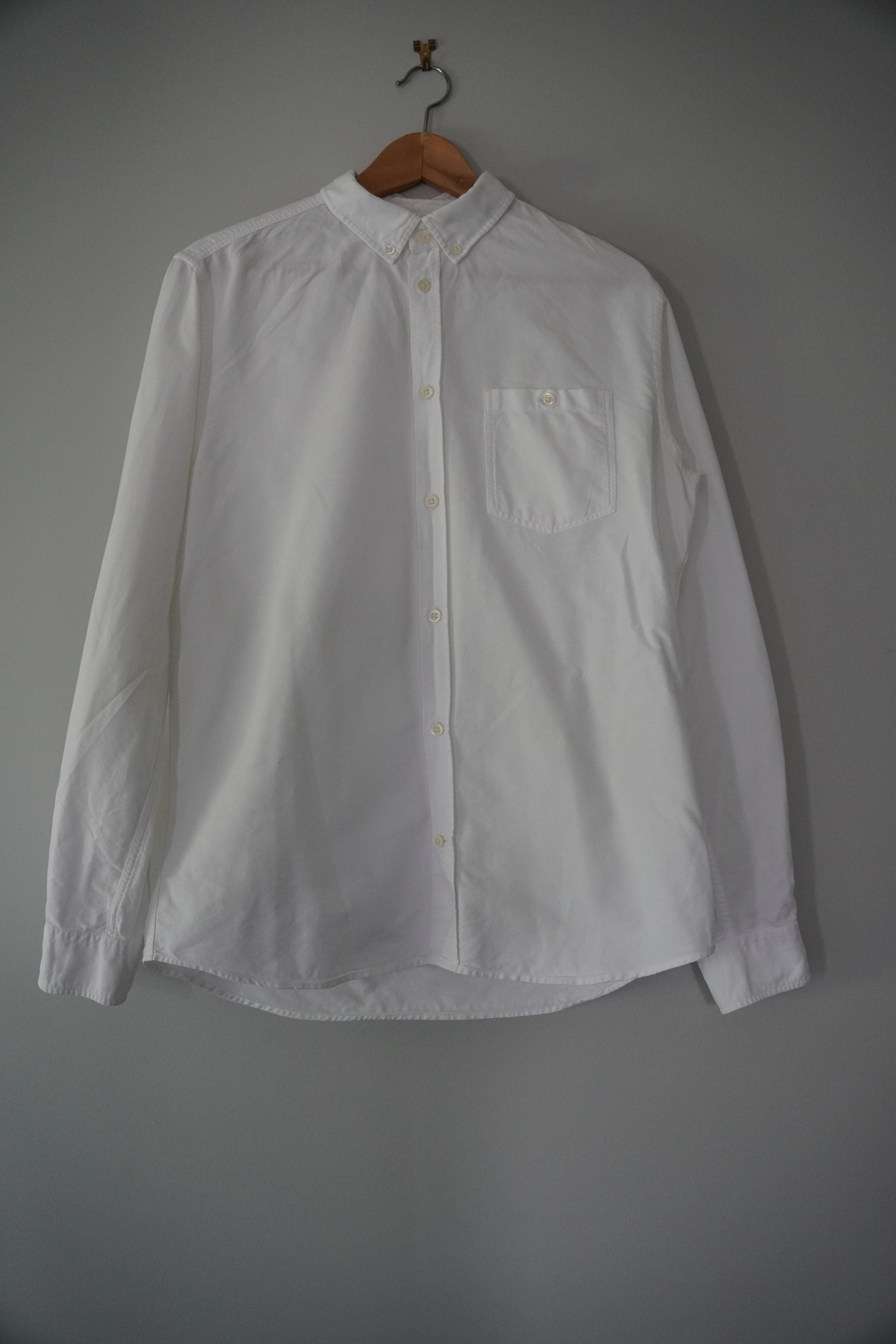White long-sleeve button-up shirt