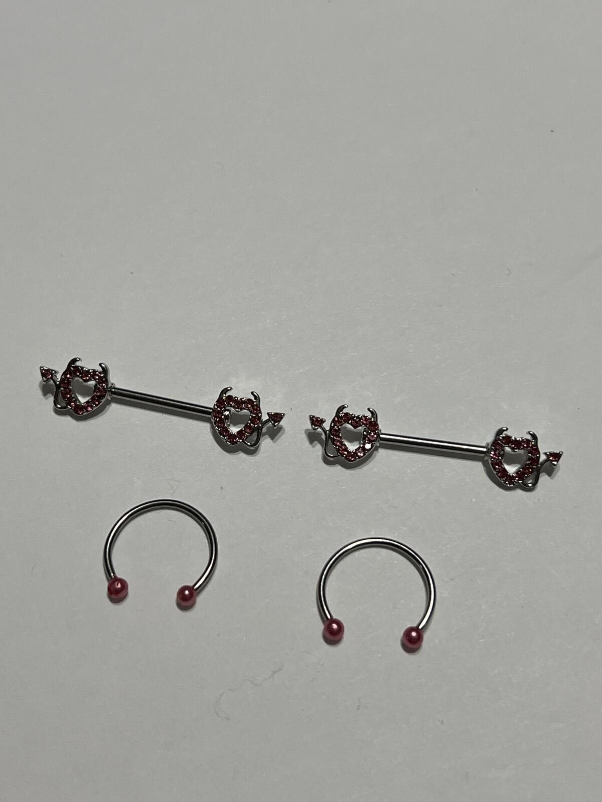 The Unbranded Brand Set of 2 Silver Tone Body Piercing Rings Pink Rhinestone Size ONE SIZE - 1 Thumbnail
