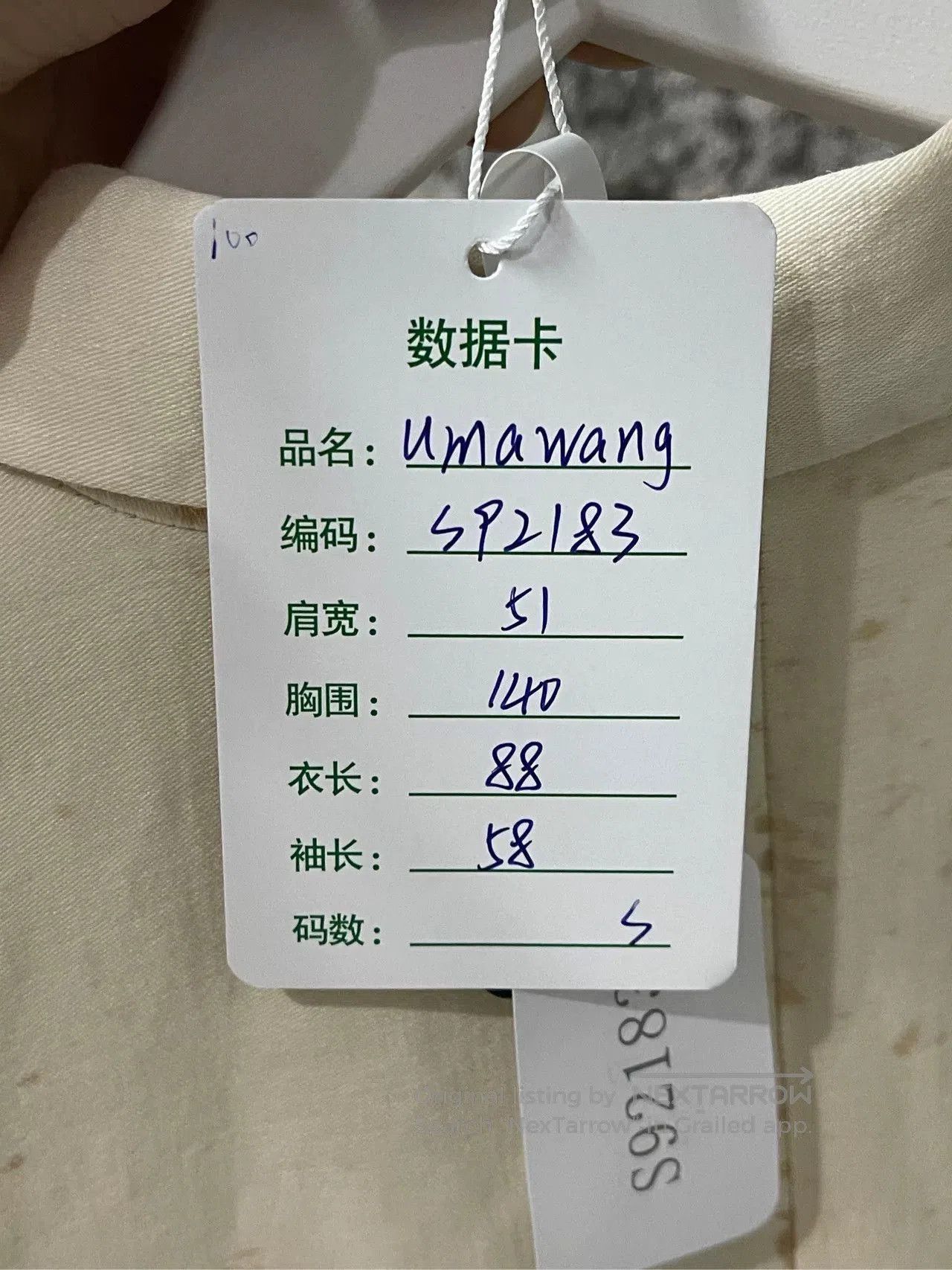 uma wang irregular tea-dyed coat.