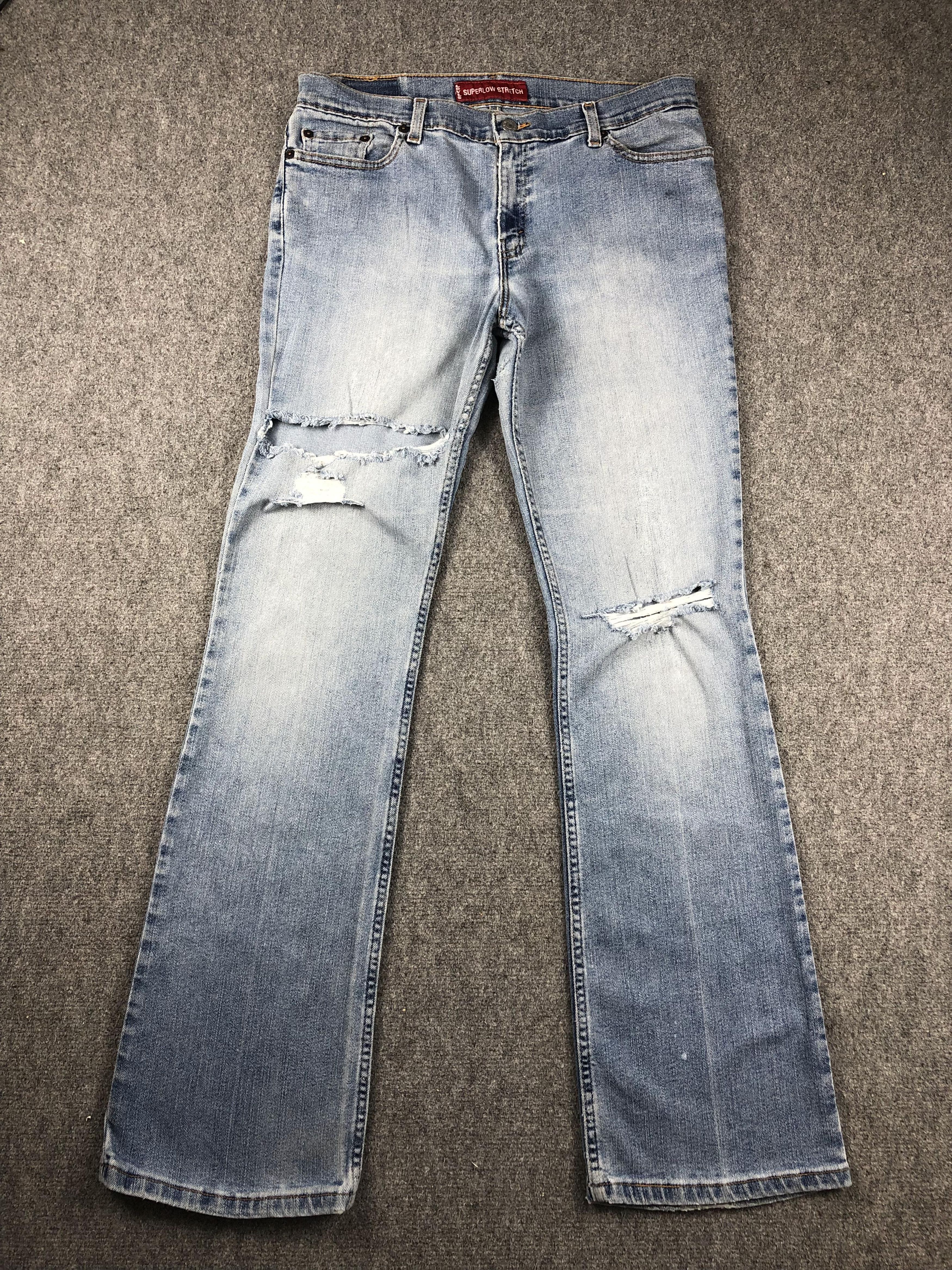 Image of Levis 518 Flared Bootcut Distressed Jeans in Blue Denim, Men's (Size 31)