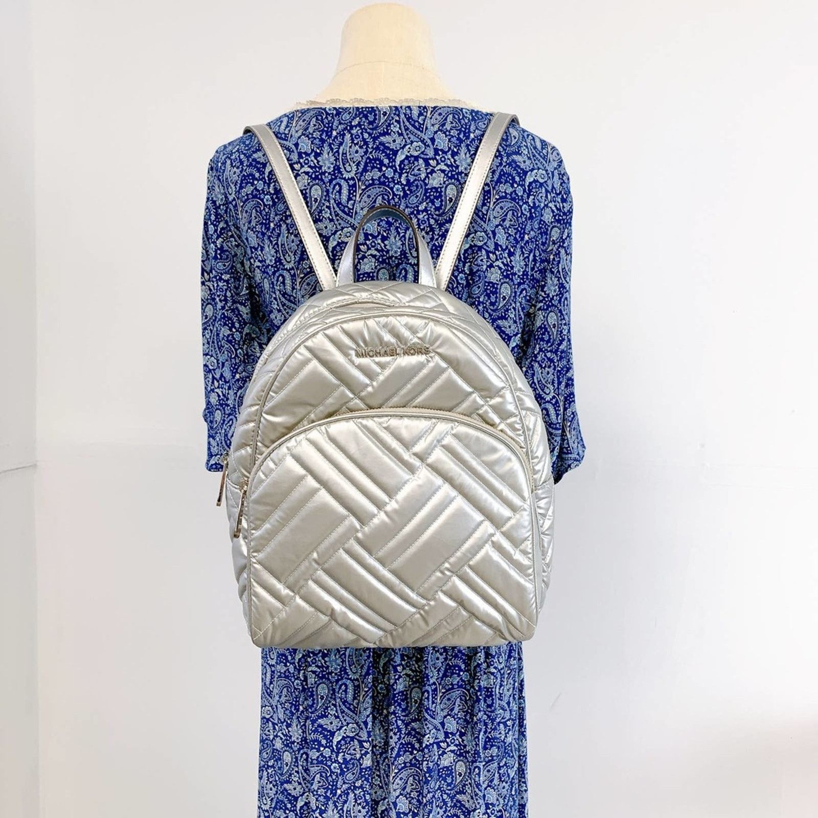 Michael Kors ABBEY silver backpack Authentic Michael Kors Floral Abbey Medium Backpack... | Depop main image 3