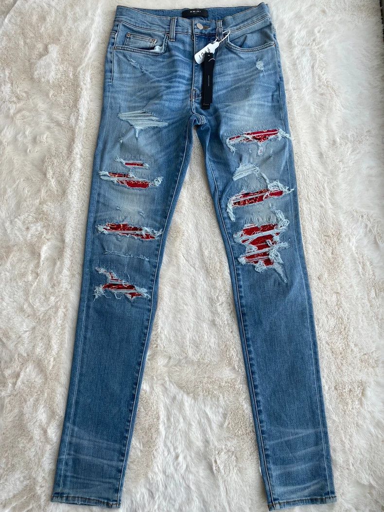 Amiri Washed blue and red cashew Thrash jeans -DMC