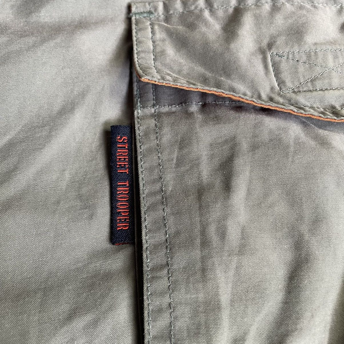 20471120 🇯🇵 291295 = HOMME 3 WAYS NYLON PARACHUTE CARGO PANTS Size US 34 / EU 50 - 22 Thumbnail