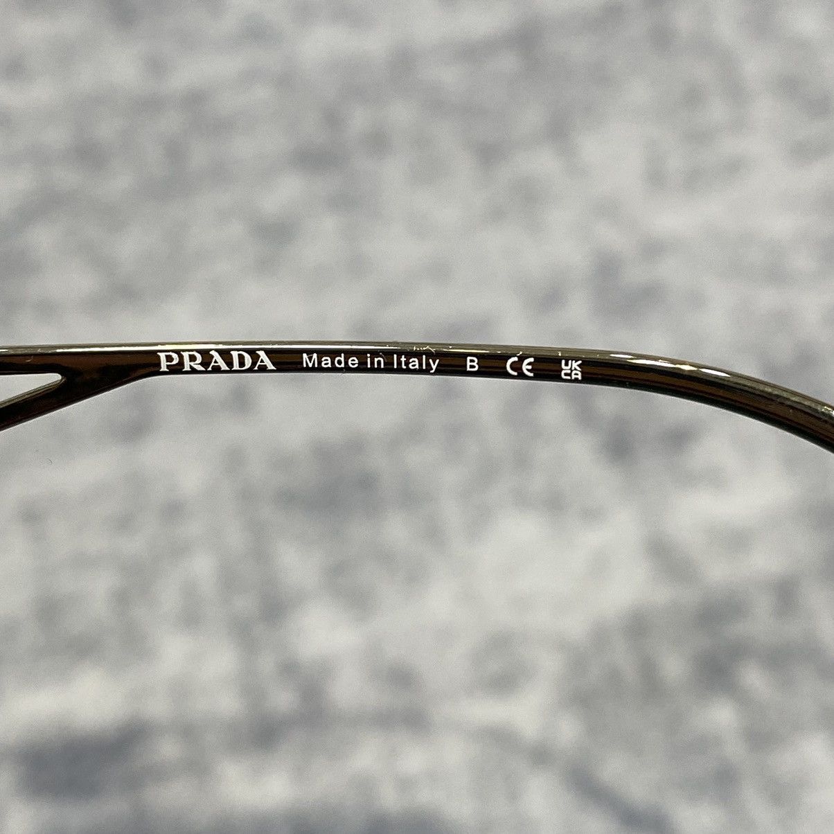 PRADA 0PR 14YS 12R50K TRANSPARENT GREY
