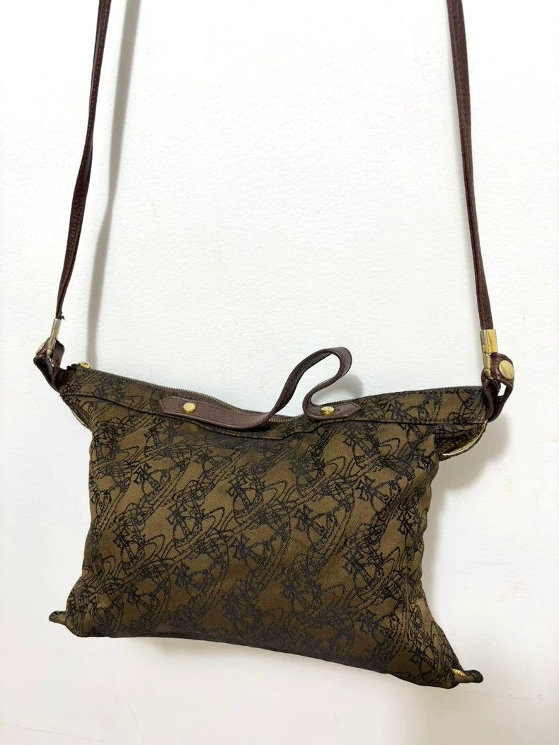 Vivienne Westwood Vivienne Westwood size os Mid-century gold Saturn full logo Size ONE SIZE - 1 Thumbnail