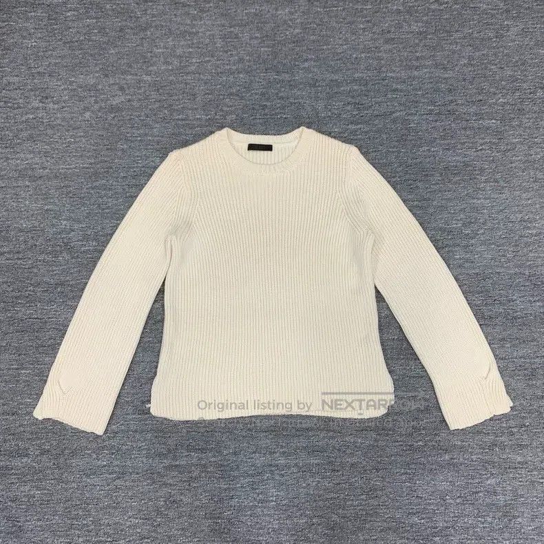 The Row White wool knit sweater
