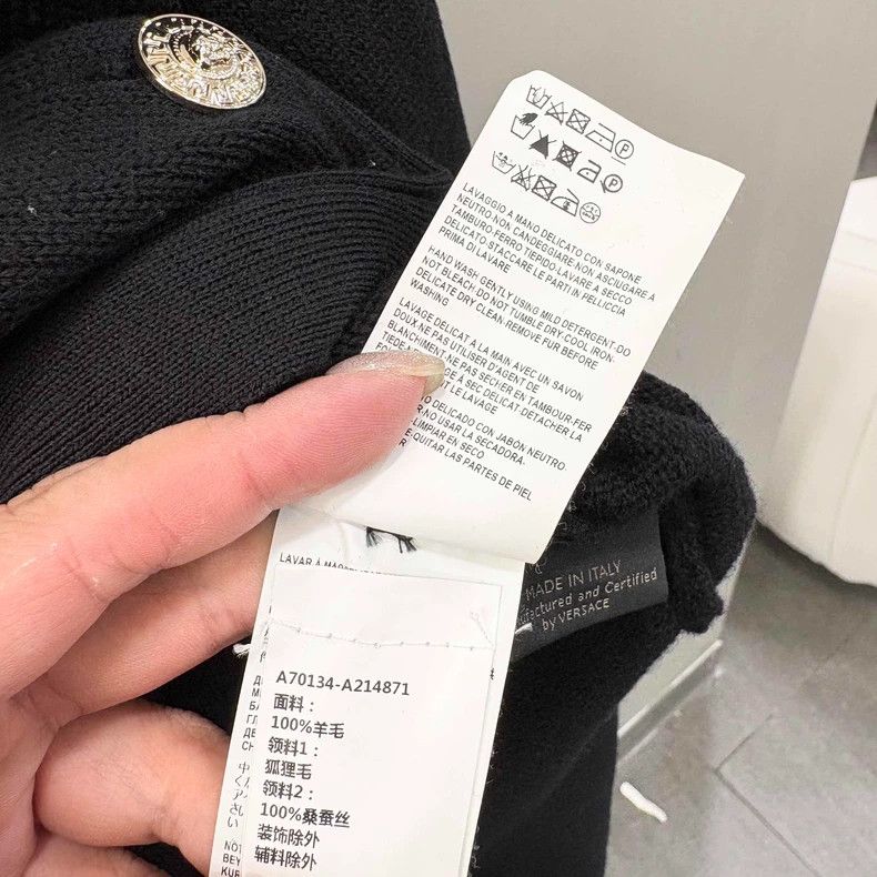 Versace A fox fur stand-up collar knitted coat