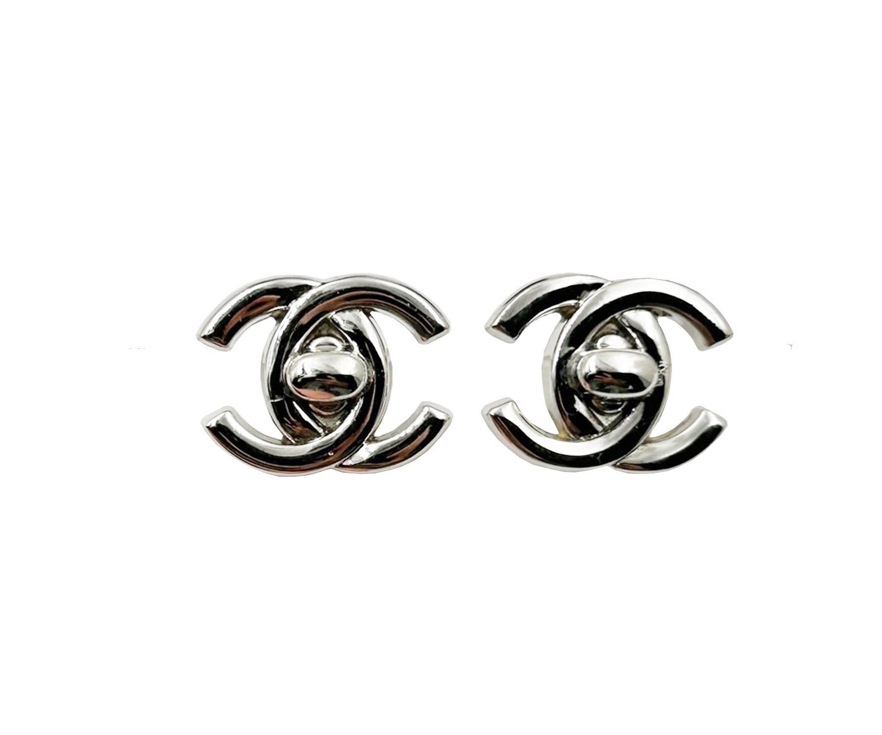 image of Chanel Vintage Silver Cc Turnlock Clip On Earrings, Women's