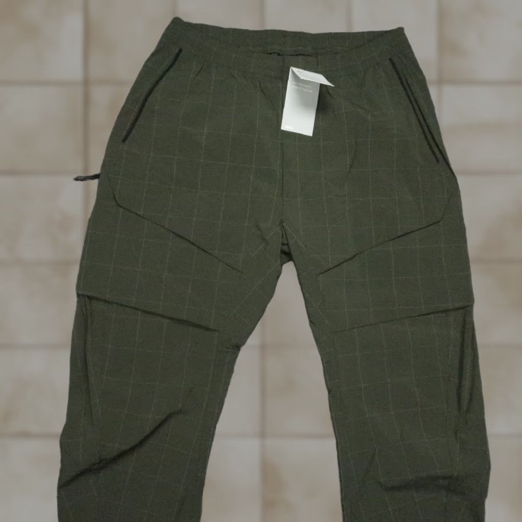 Nike Nike Pants Men Large Tall Green Tech Repel Pack Woven Cargo Zip Pocket NWT Size US 33 - 1 Thumbnail