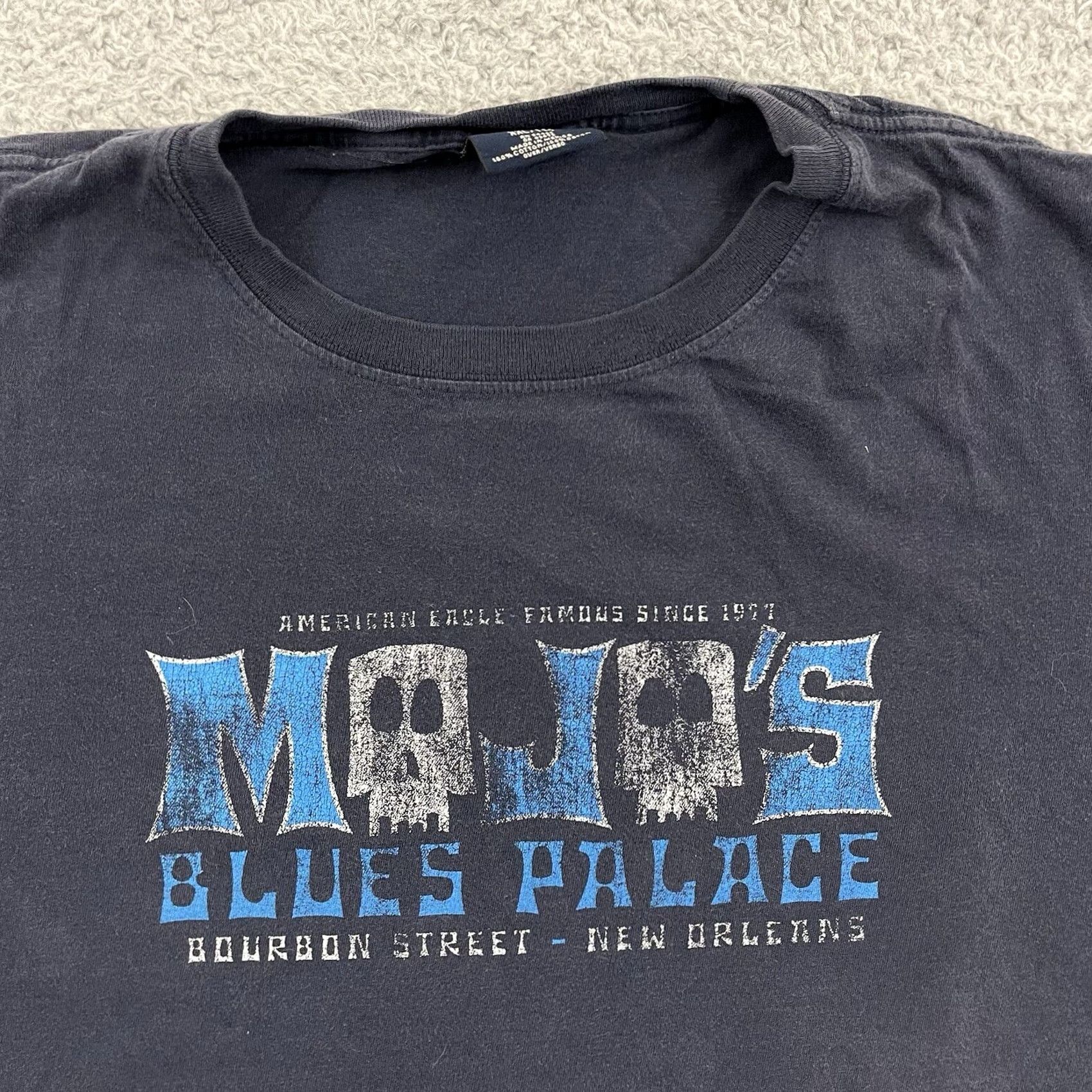 American Eagle Outfitters VINTAGE Mojos Blues Palace T-Shirt Adult 2XL Blue Graphic Tee Shirt Regular Mens Blue 2000s USA Graphic Print Cotton Skull Adventure Time Angel Bike Size US XXL / EU 58 / 5 - 3 Thumbnail