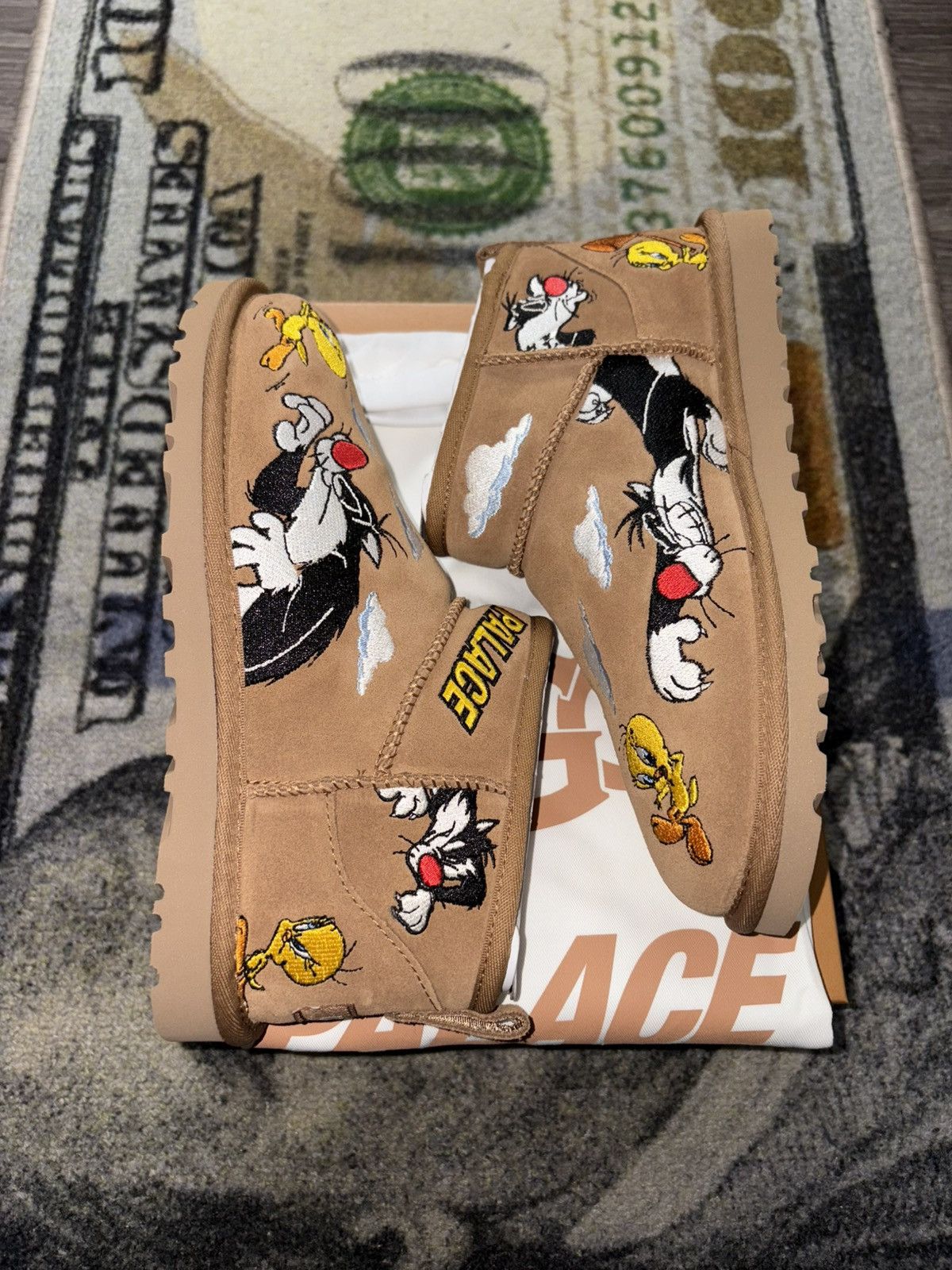Palace × Ugg Palace UGG Classic Ultra Mini Boot Looney Tunes Chestnut Size US 11 / EU 44 - 1 Thumbnail