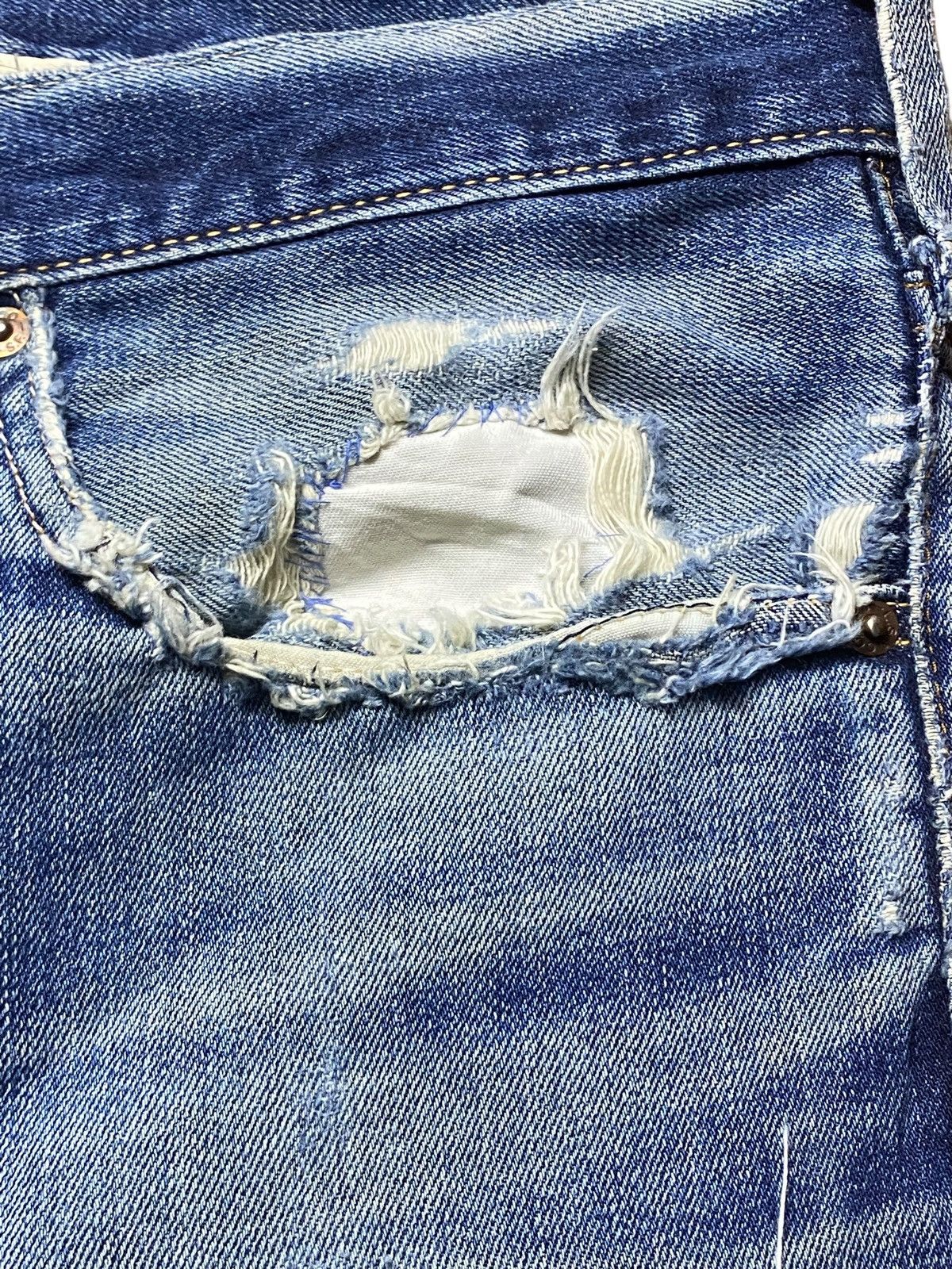 Vintage Levis 502 Blue Wash Ripped Straight Jeans