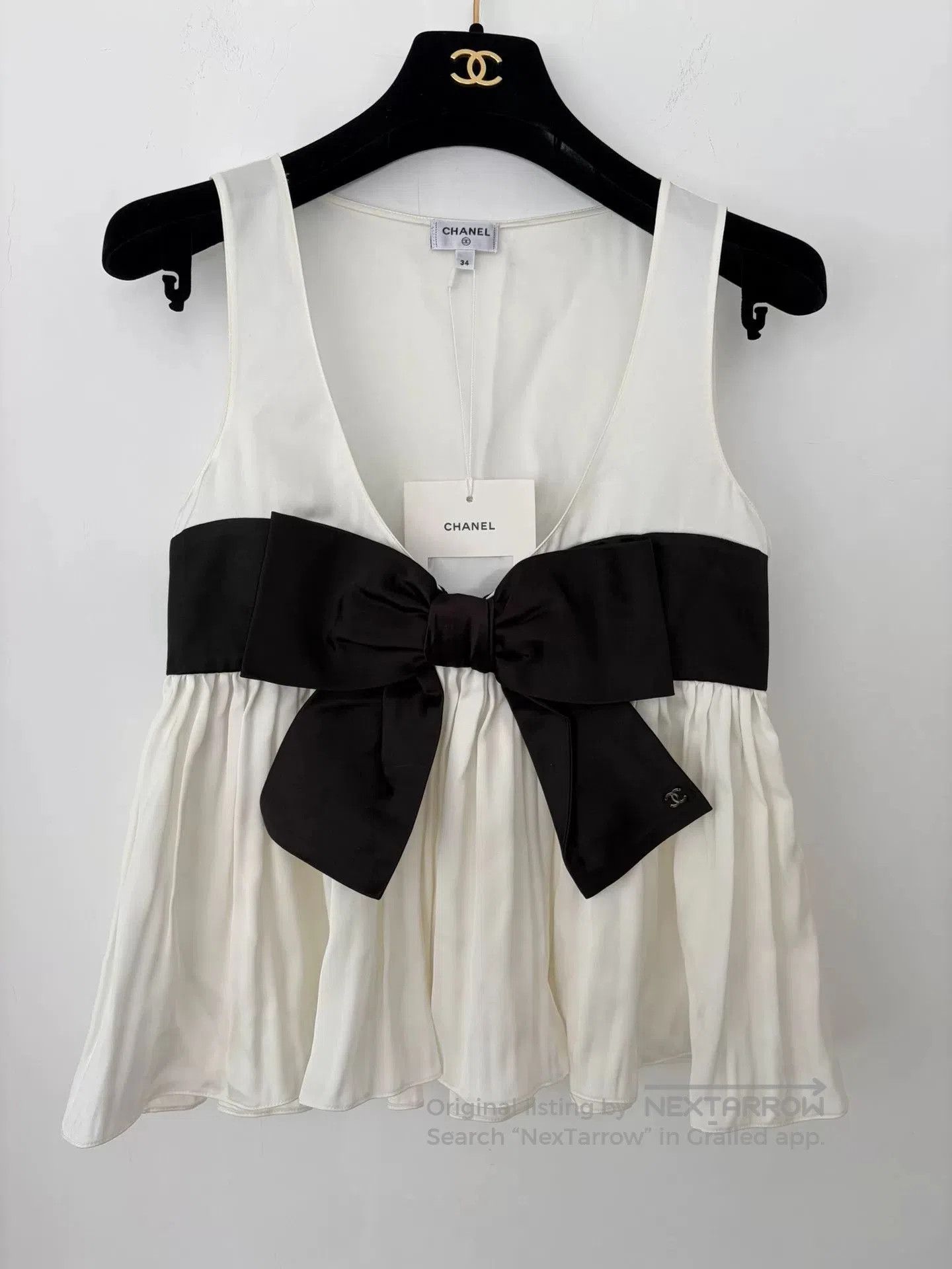 Chanel 25K White Bow Sleeveless Top.