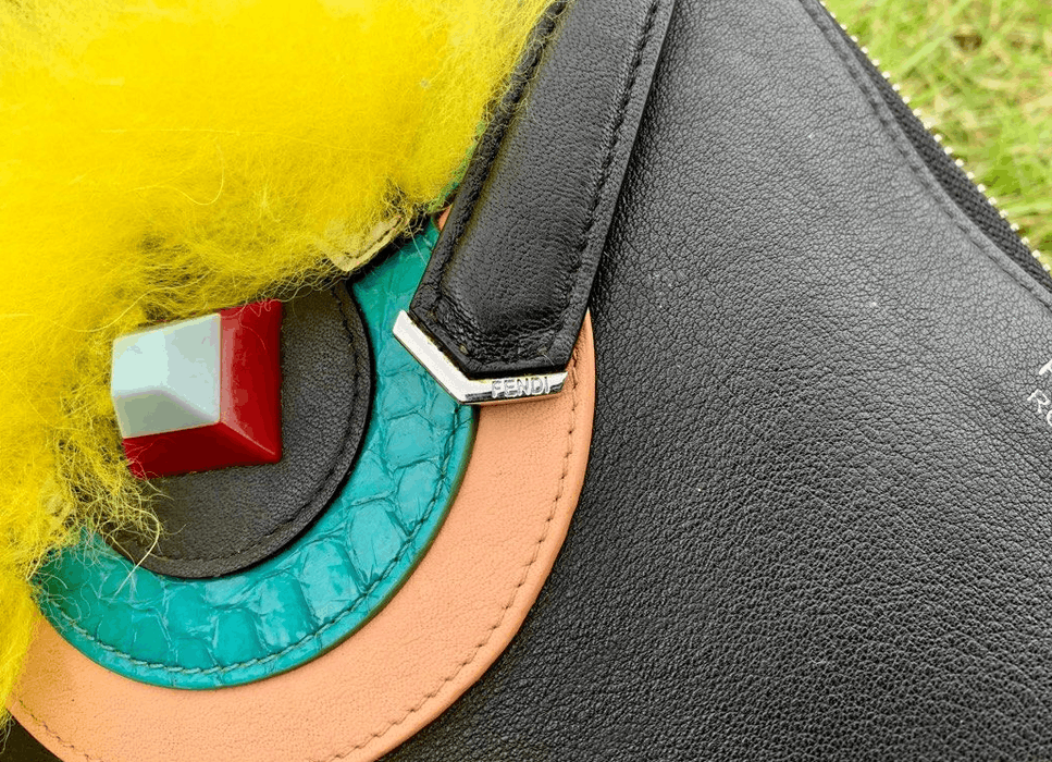 Fendi Fendi monster leather clutch bag | Grailed