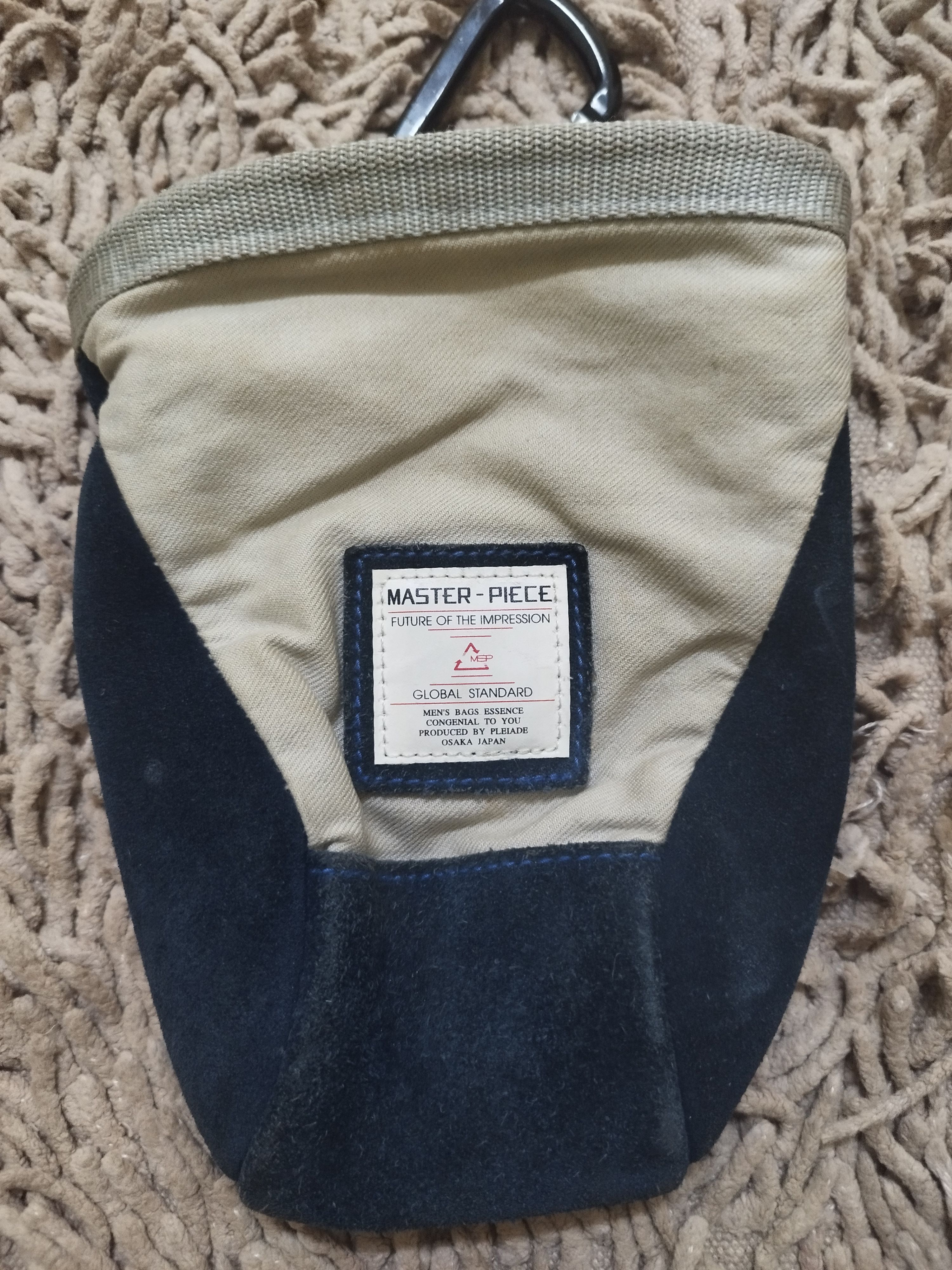 image of Archival Clothing x Masterpiece Pouch Bag in Cream, Men's