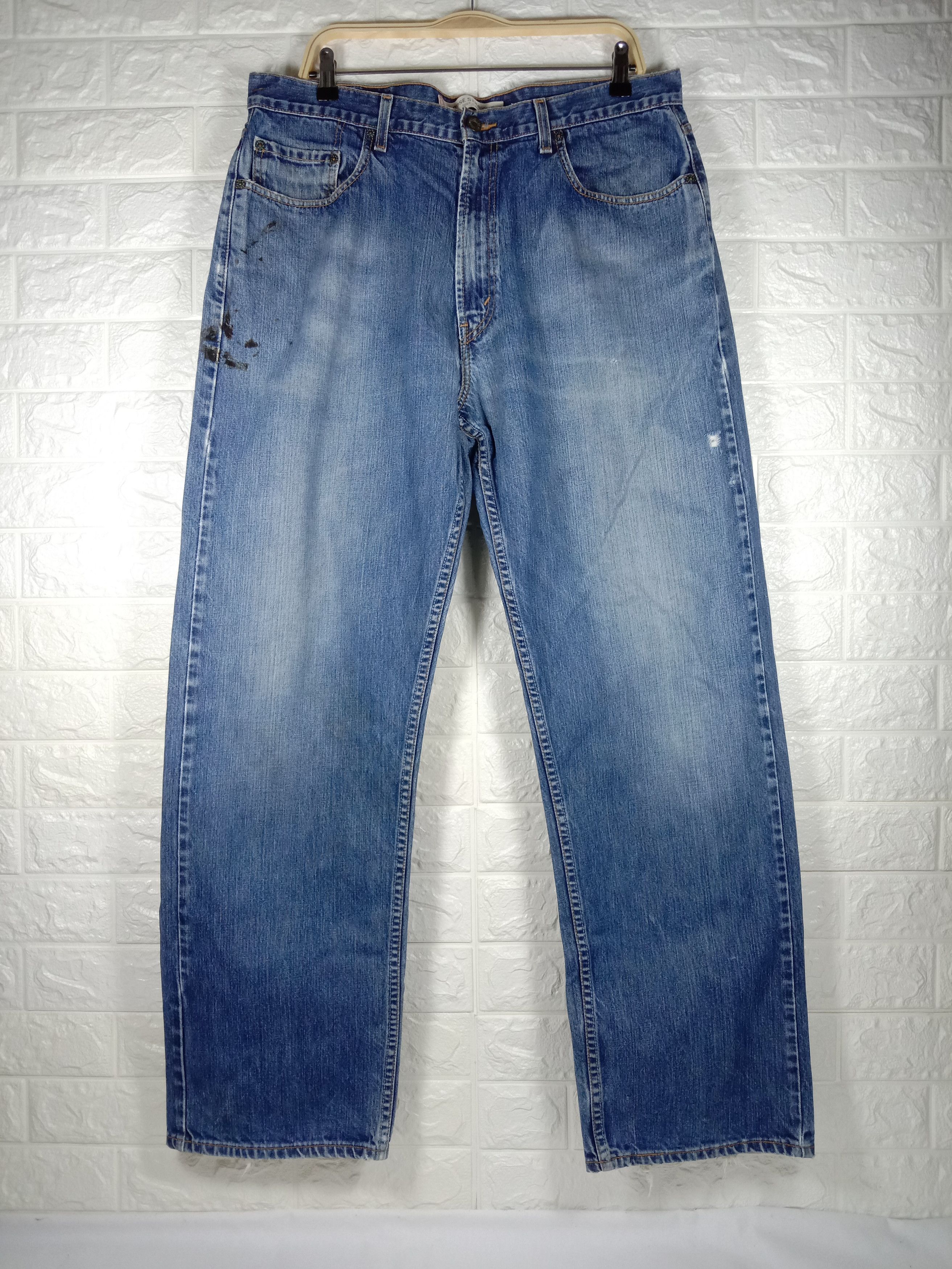 image of Vintage Levi’S 569 Jeans Loose Straight Distressed Denim in Blue, Men's (Size 36)