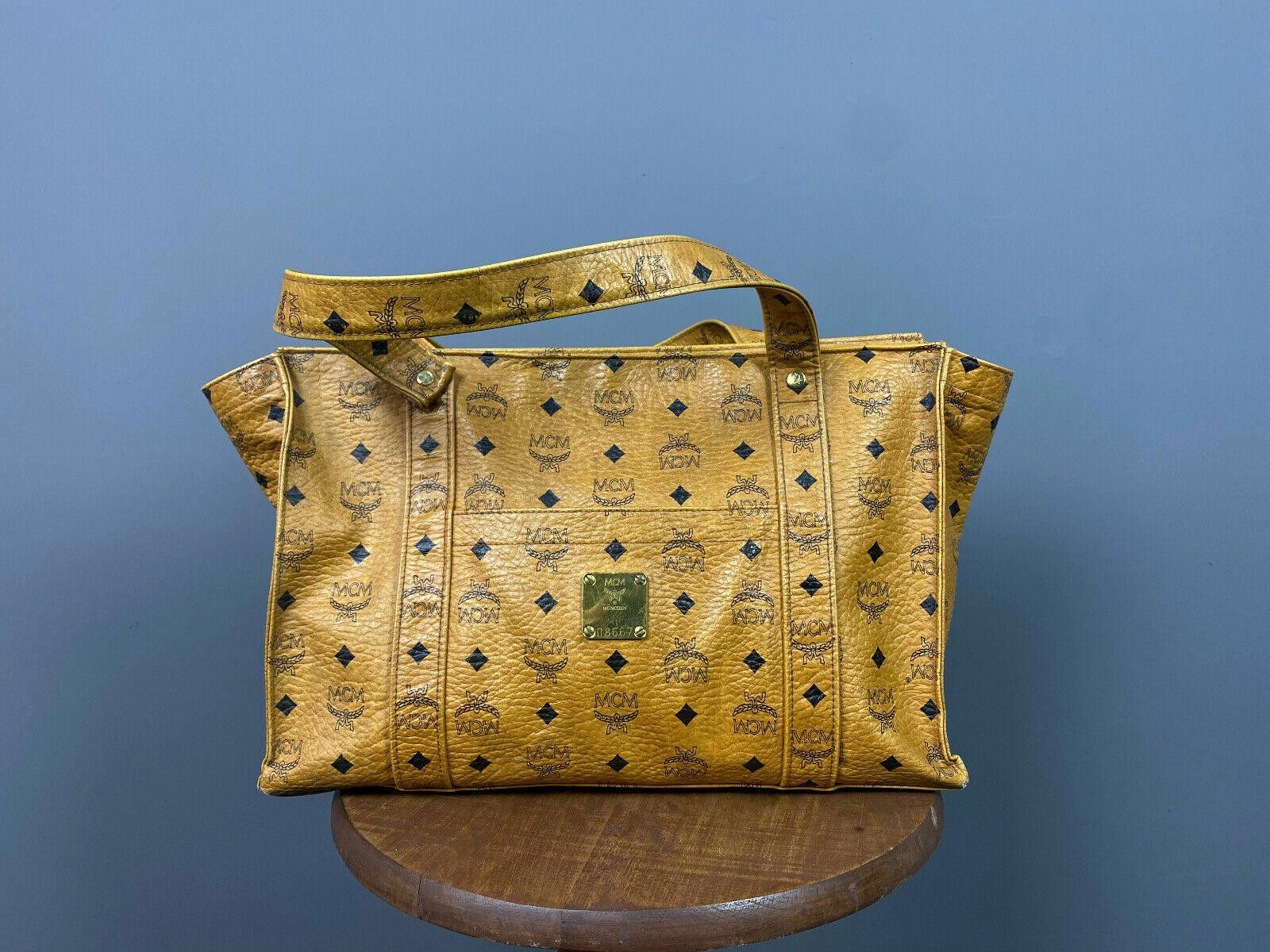 MCM Ladies MCM Brown Leather Monogram Logo Tote Bag Shoulder Bag Size ONE SIZE - 1 Thumbnail