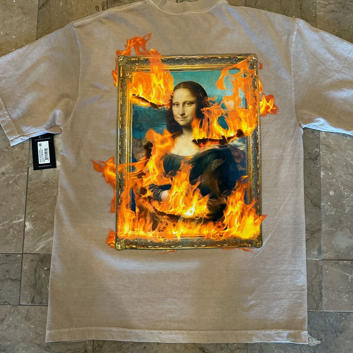 Pleasures Pleasures Mona Lisa Fire Graphic T-Shirt – Tan / Beige – M Size US M / EU 48-50 / 2 - 1 Thumbnail