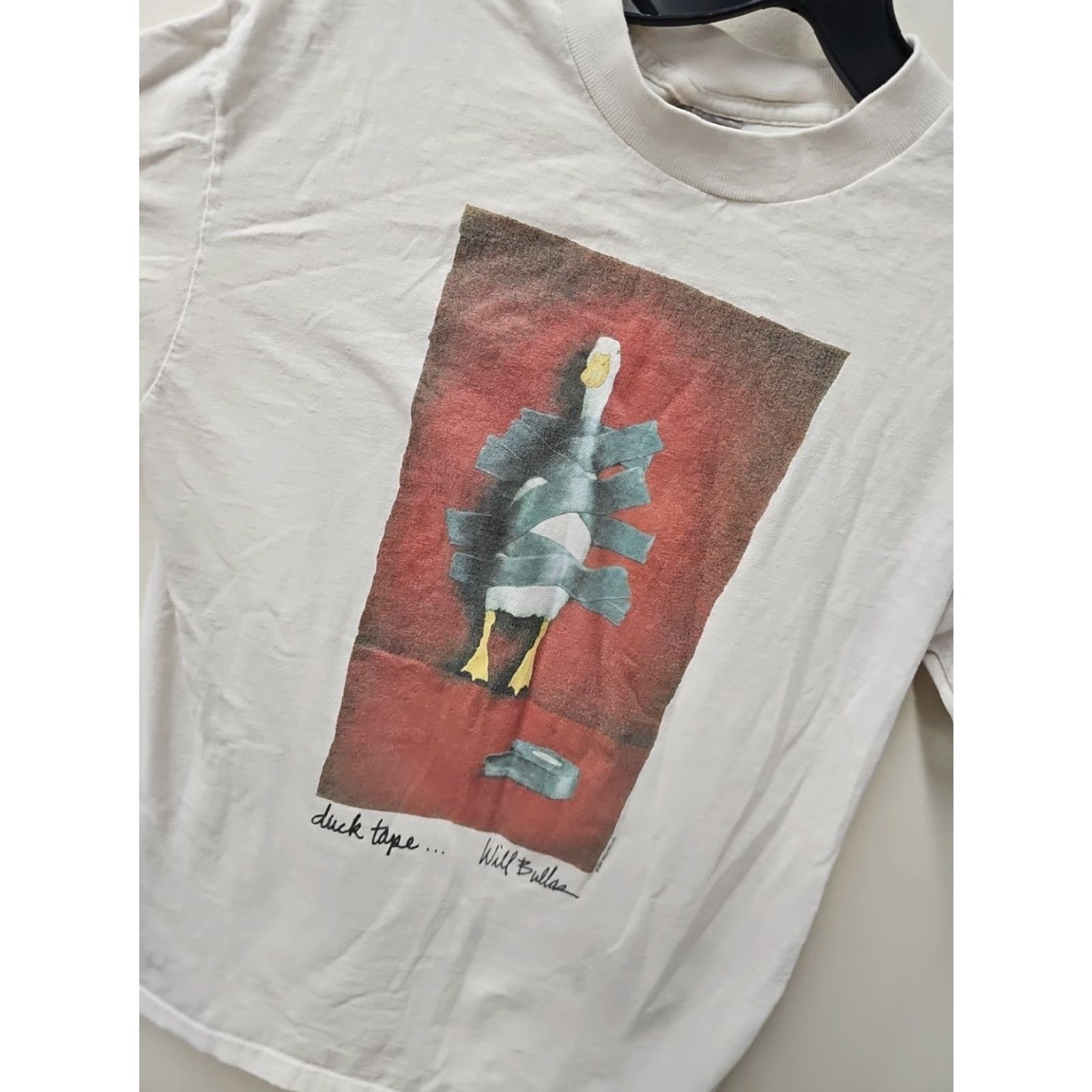 Vintage VINTAGE Duck Tape Art Shirt Mens Adult Medium Beige 1990s Graphic Tee Oneita Short Sleeve Early Distressed 18 Chest 26.5 Length Size US M / EU 48-50 / 2 - 3 Thumbnail