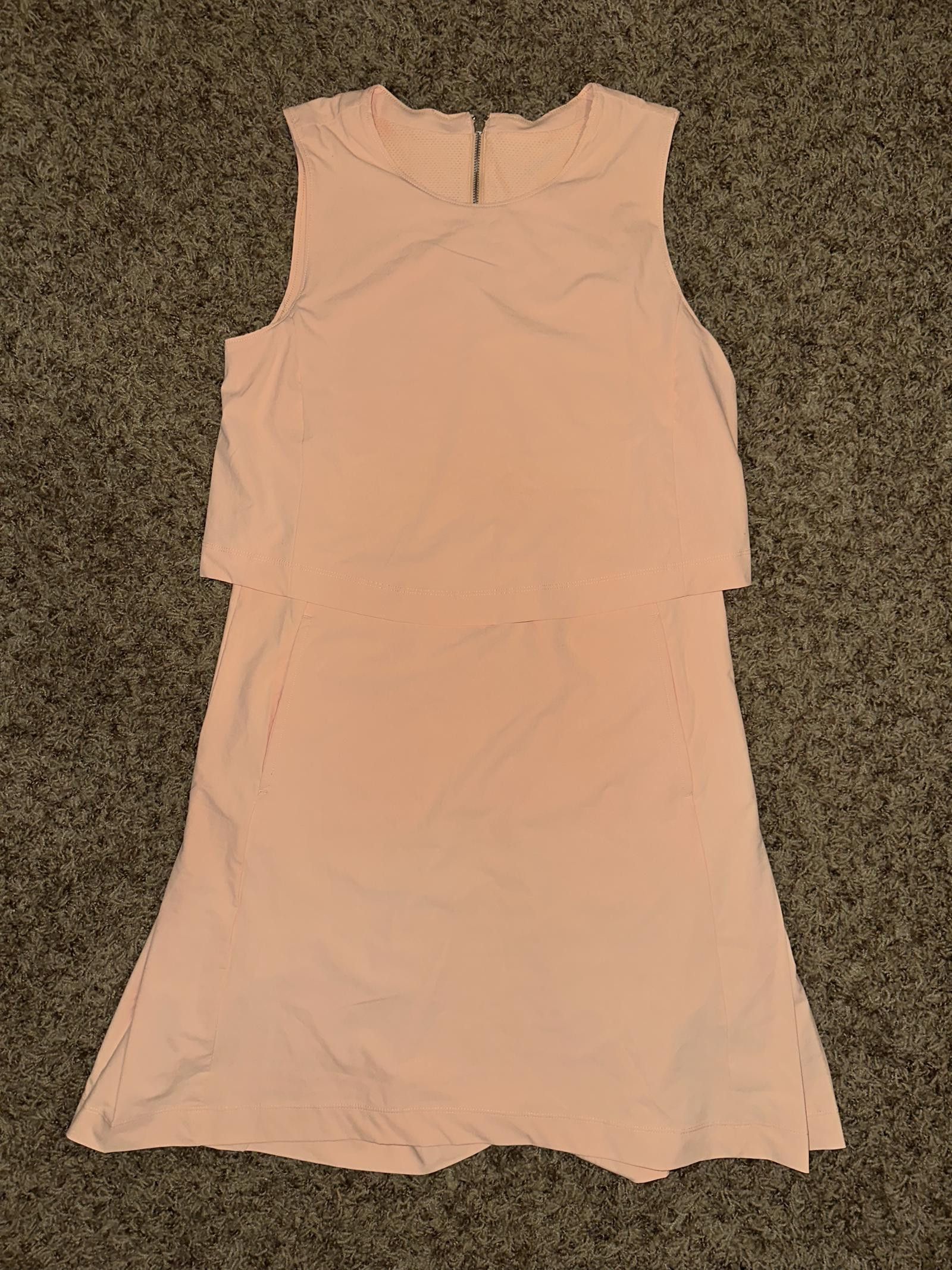 image of Nike Women's Golf Flex Ace Peach Dress Sample in Pink (Size Small)