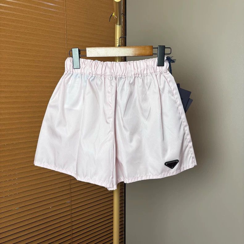 Prada Prada Pink triangle logo shorts 2502-Nextarrow Size US 38 / EU 54 - 1 Thumbnail