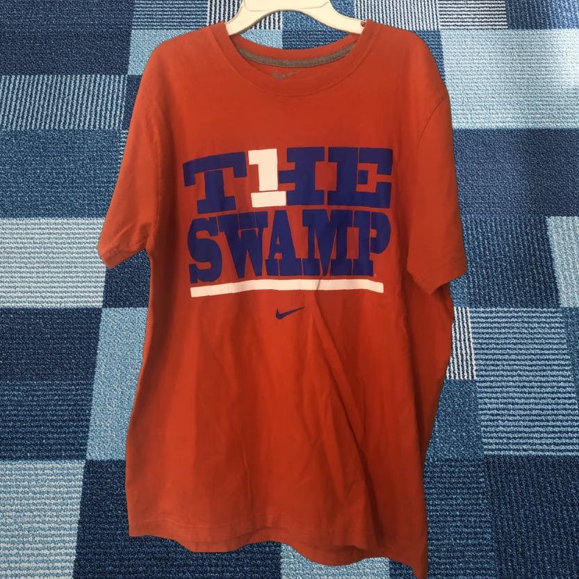 Nike **Nike Men's Medium Orange Florida Gators The Swamp Crew Neck T-Shirt** User: **Nike Men's Medium Orange Florida Gators The Swamp T-Shirt** Size US M / EU 48-50 / 2 - 1 Thumbnail