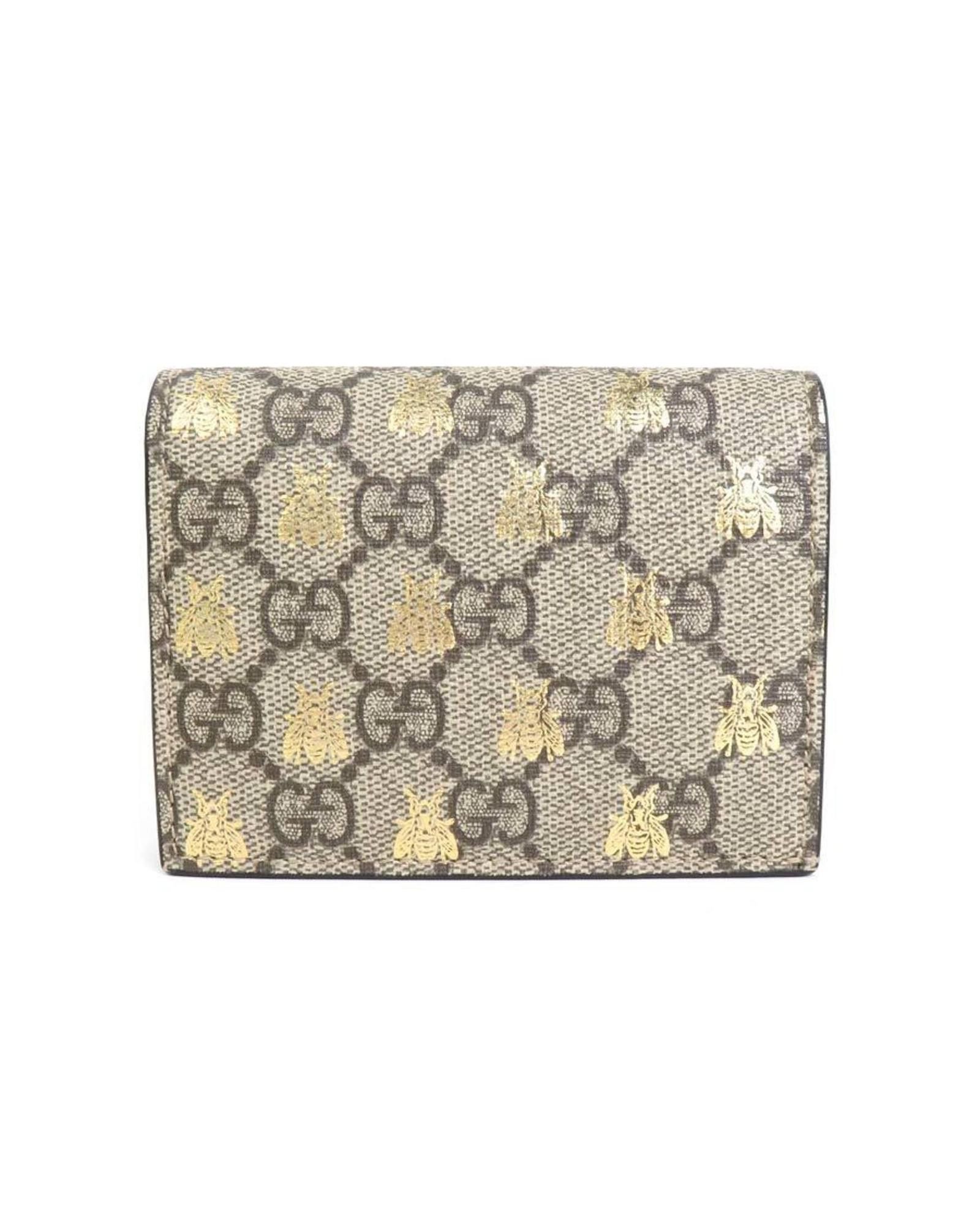 image of Gucci Canvas Animal Print Bi-Fold Wallet in Brown, Women's