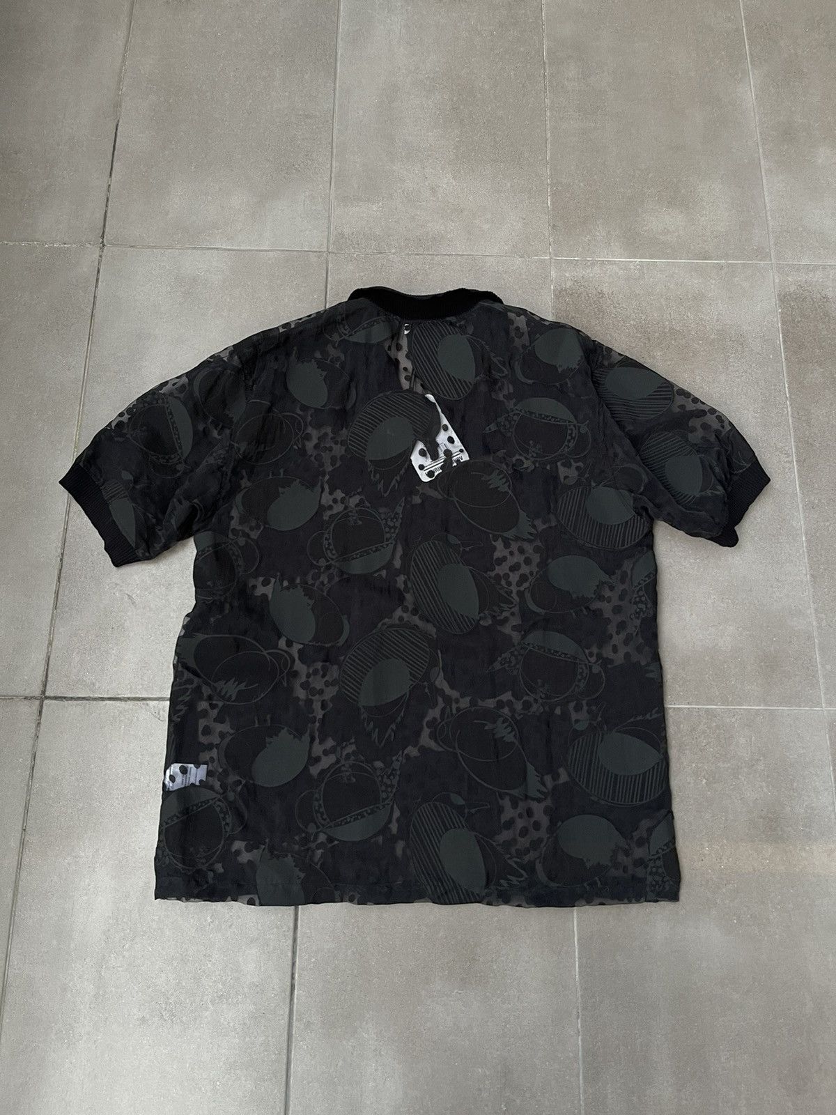 Henrik Vibskov !DS! SS23 Henrik Vibskov The BIG Polo Black Polo Tee Size US M / EU 48-50 / 2 - 16 Thumbnail