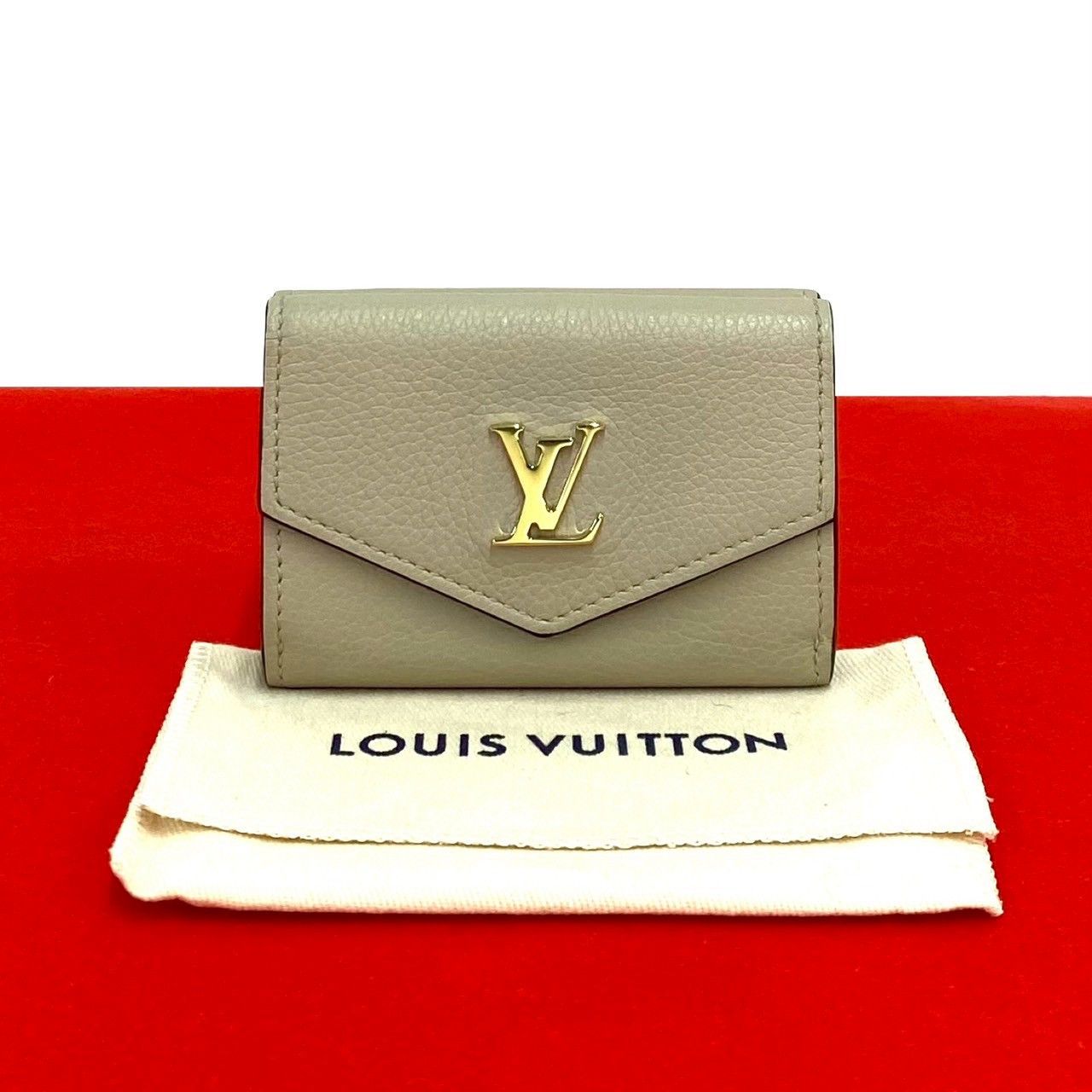 Louis Vuitton Louis Vuitton Louis Vuitton Portefeuille Lock Mini Wallet Leather Short Wallet DUTY FREE for USA Size ONE SIZE - 1 Thumbnail