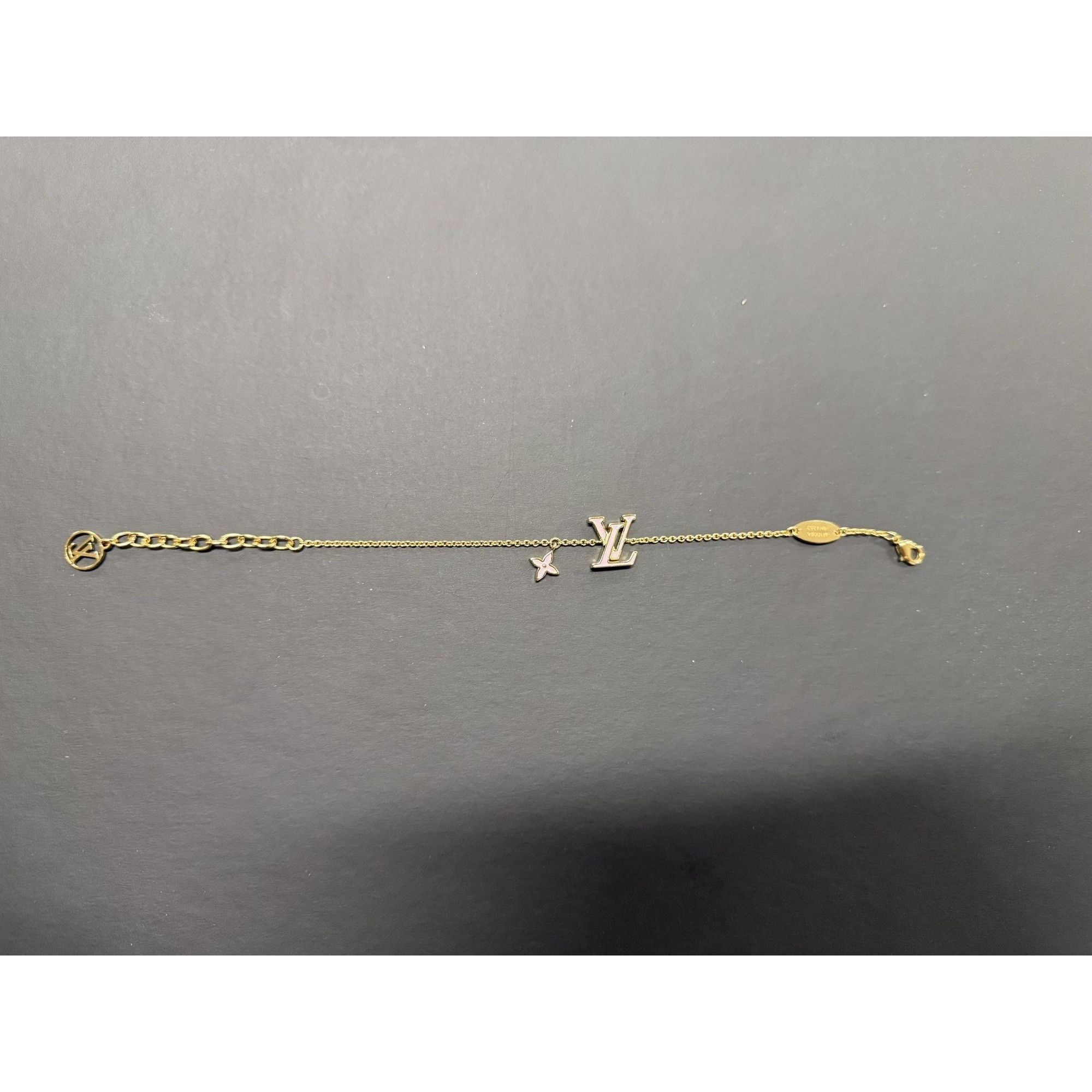 Louis Vuitton Louis Vuitton Gold-Tone Bracelet With LV Logo & Flower Charm Size ONE SIZE - 8 Thumbnail