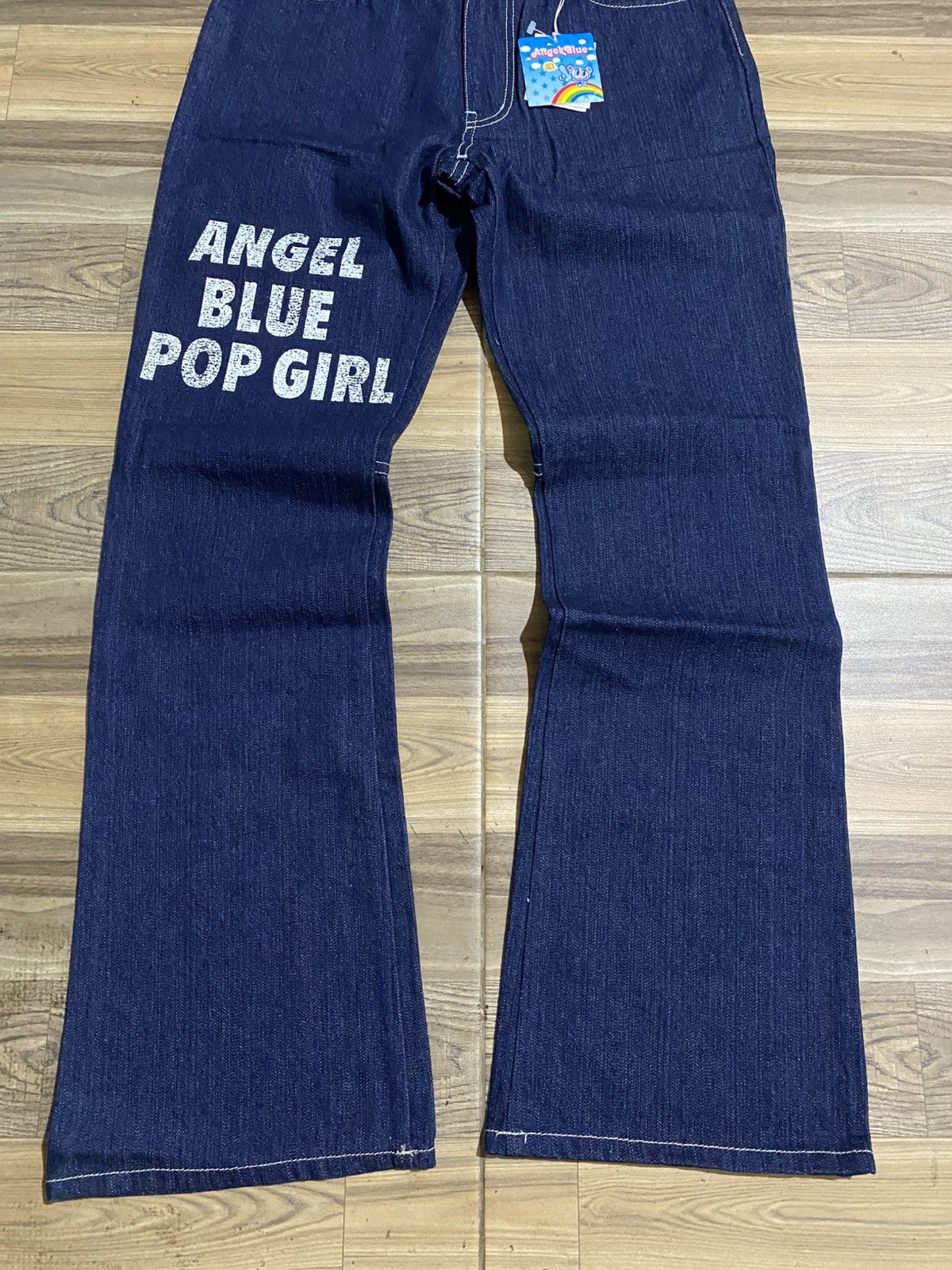 DEAD STOCK ANGEL BLUE POP GIRL FLARED JEANS Womenswear