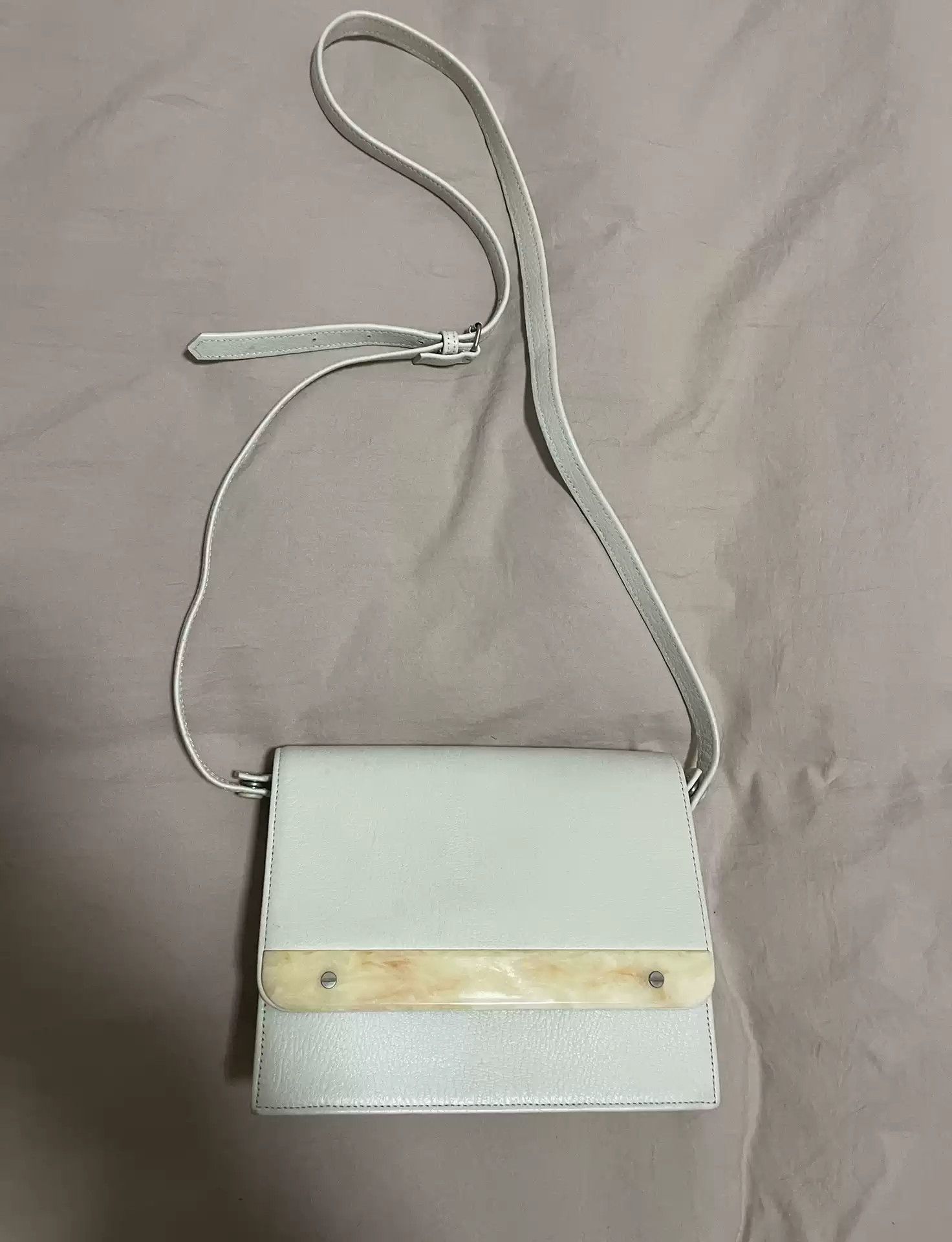 Pau Gaultier Milk White Let Pau Gaultier Cowhard Metal Lug Metal Lug Head Cross Body Bag
