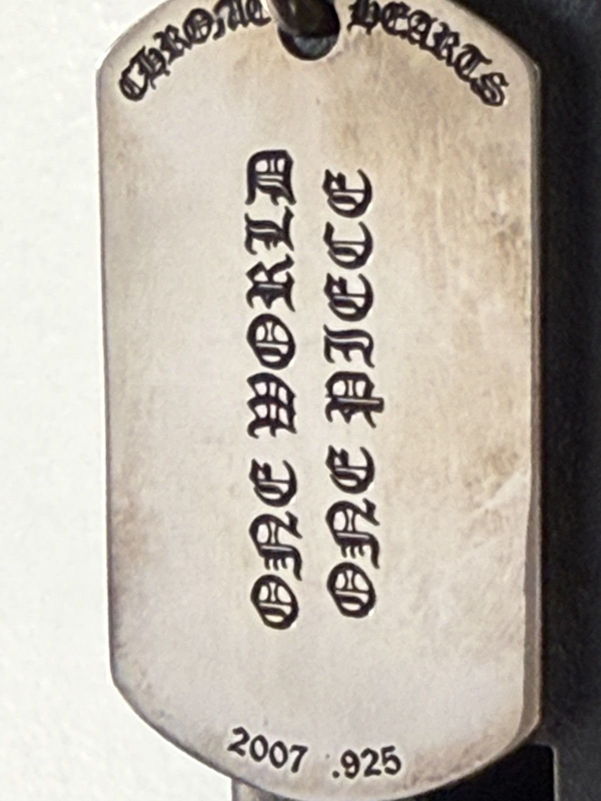 Chrome Hearts ワンピース Chrome Hearts Chrome Hearts “One World One Piece” Dog Tag | Grailed