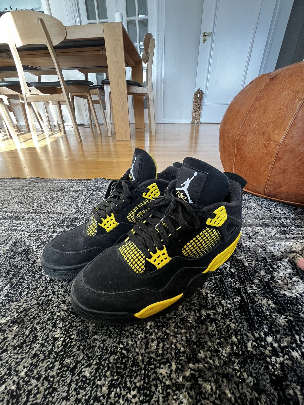 image of Jordan Brand 4 Thunder Shoes in Black, Men's (Size 11)