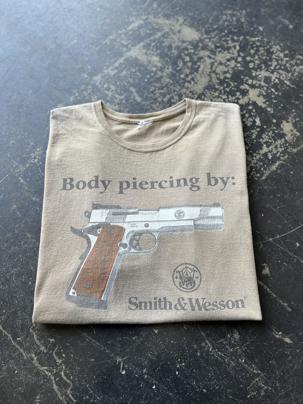 Vintage Smith & Wesson Body Piercings By Smith and Wesson T-Shirt | Grailed