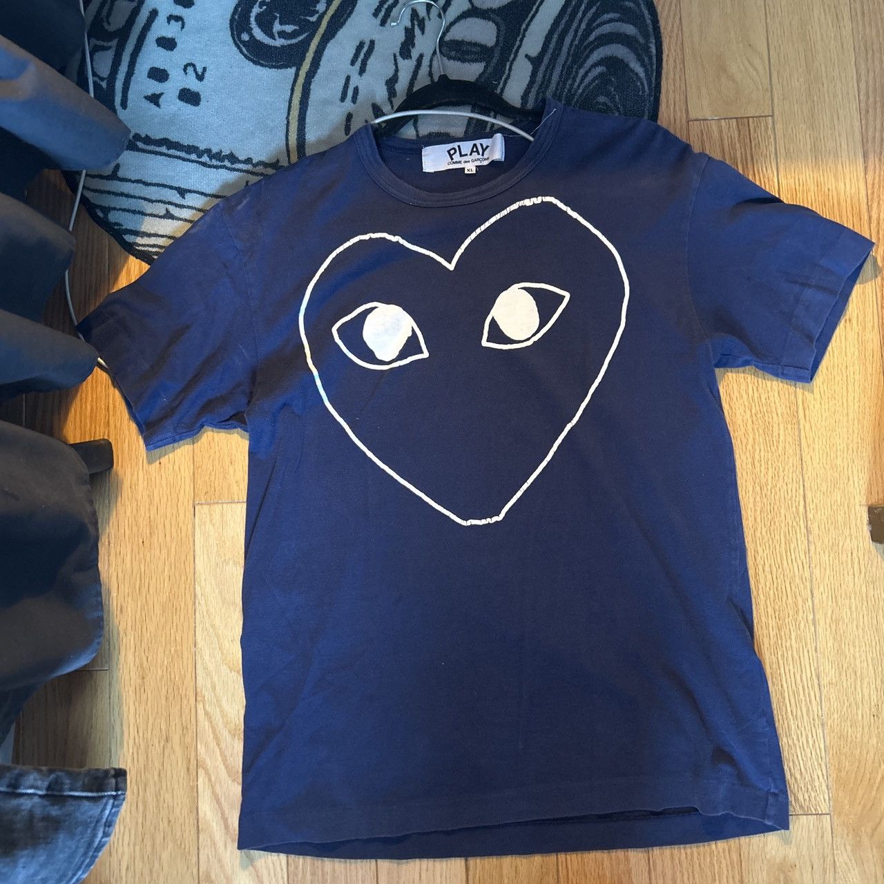 Comme des Garcons PLAY CDG Black Heart With Blue Eyes on white T