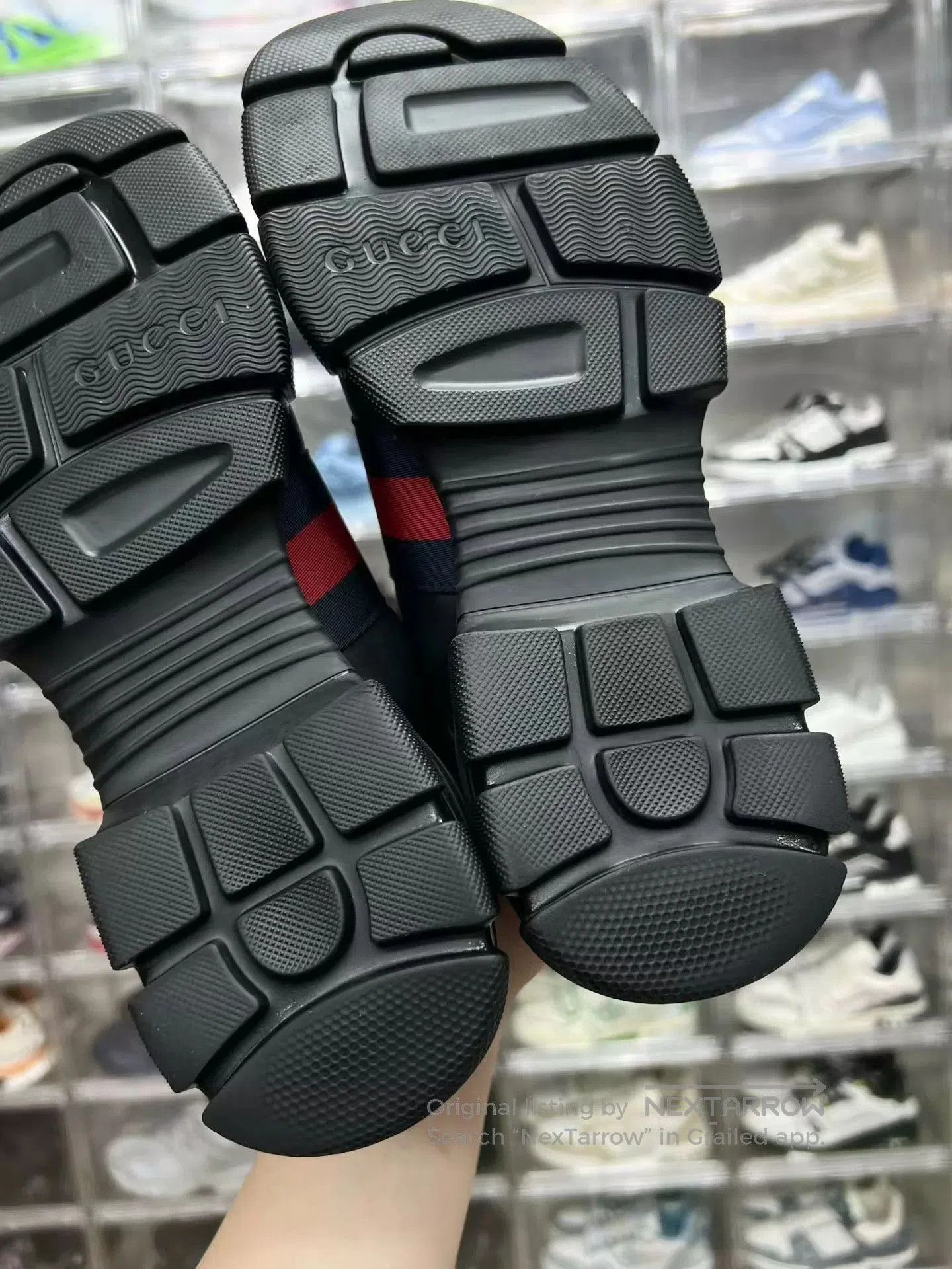 Black Low-Top Sneakers with Red and Blue Stripes.