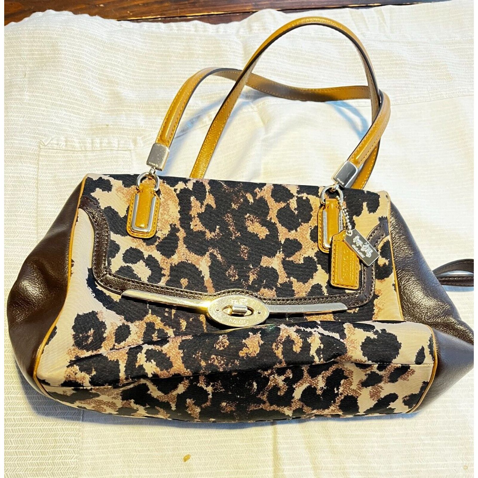 image of Coach Madison East West Ocelot Leather Canvas Animal Print in Brown, Women's
