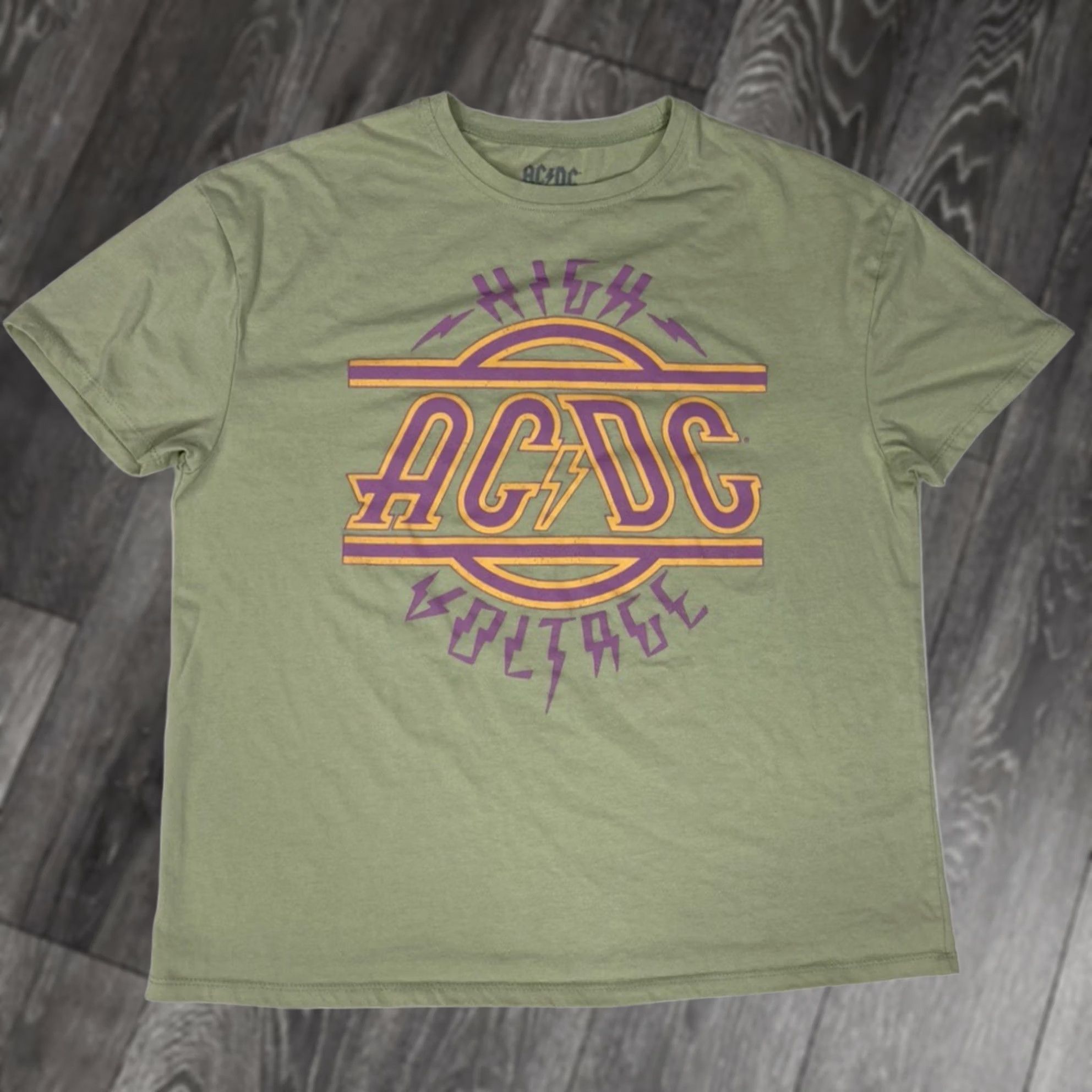 Vintage ACDC High Voltage Graphic T-shirt Women XS Oversized Green Music Rock T-Shirt Womens XS Green Oversized Casual Short Sleeve Crew Neck Pullover Size XS / US 0-2 / IT 36-38 - 1 Thumbnail