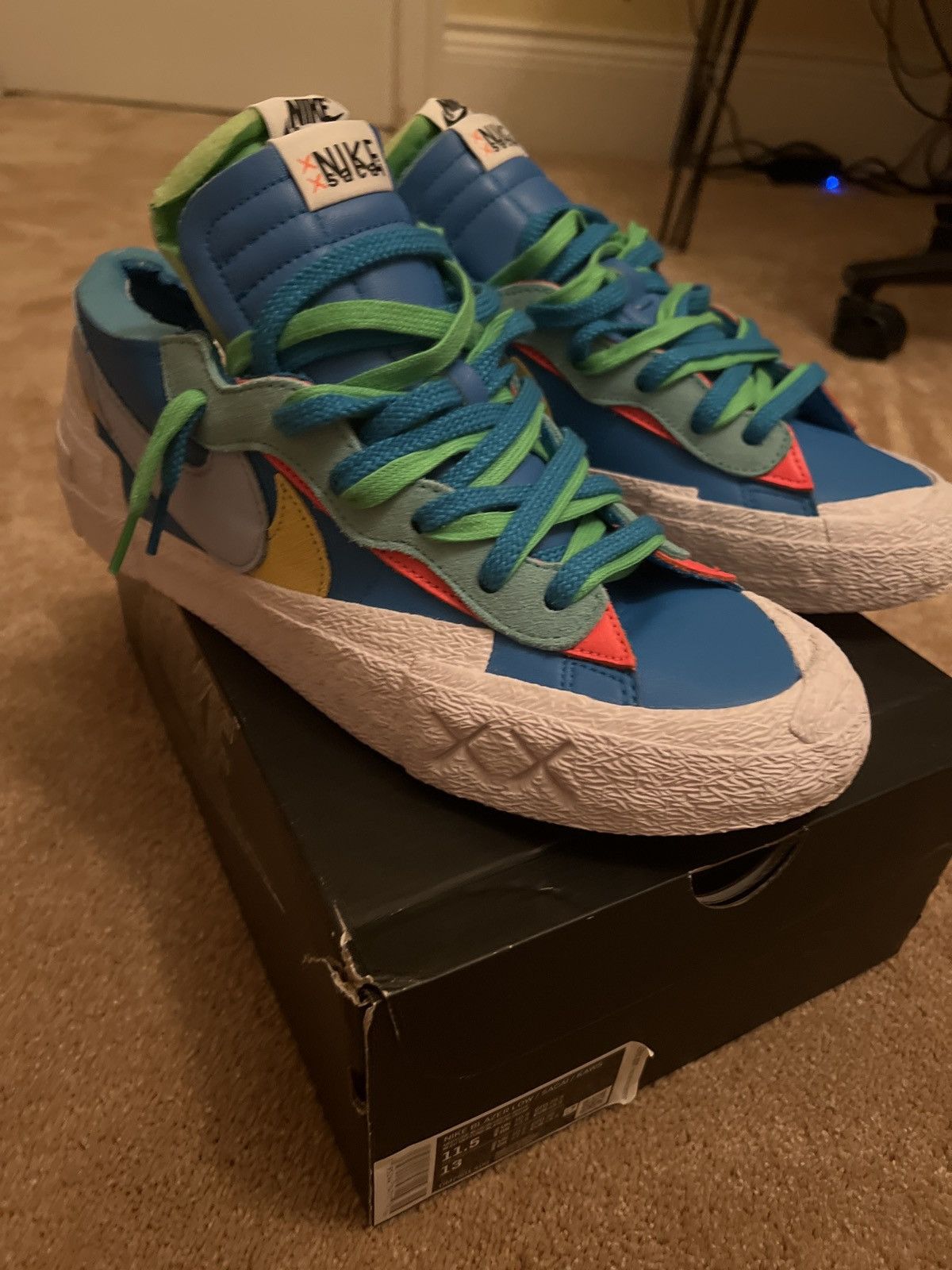 sacai x kaws nike blazers