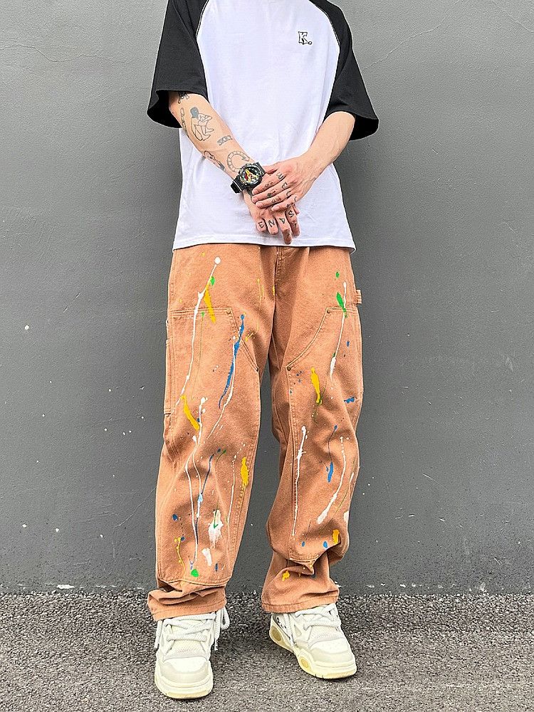 image of Paint Splatter Orange Baggy Stack Panel Denim Jeans, Men's (Size 30)