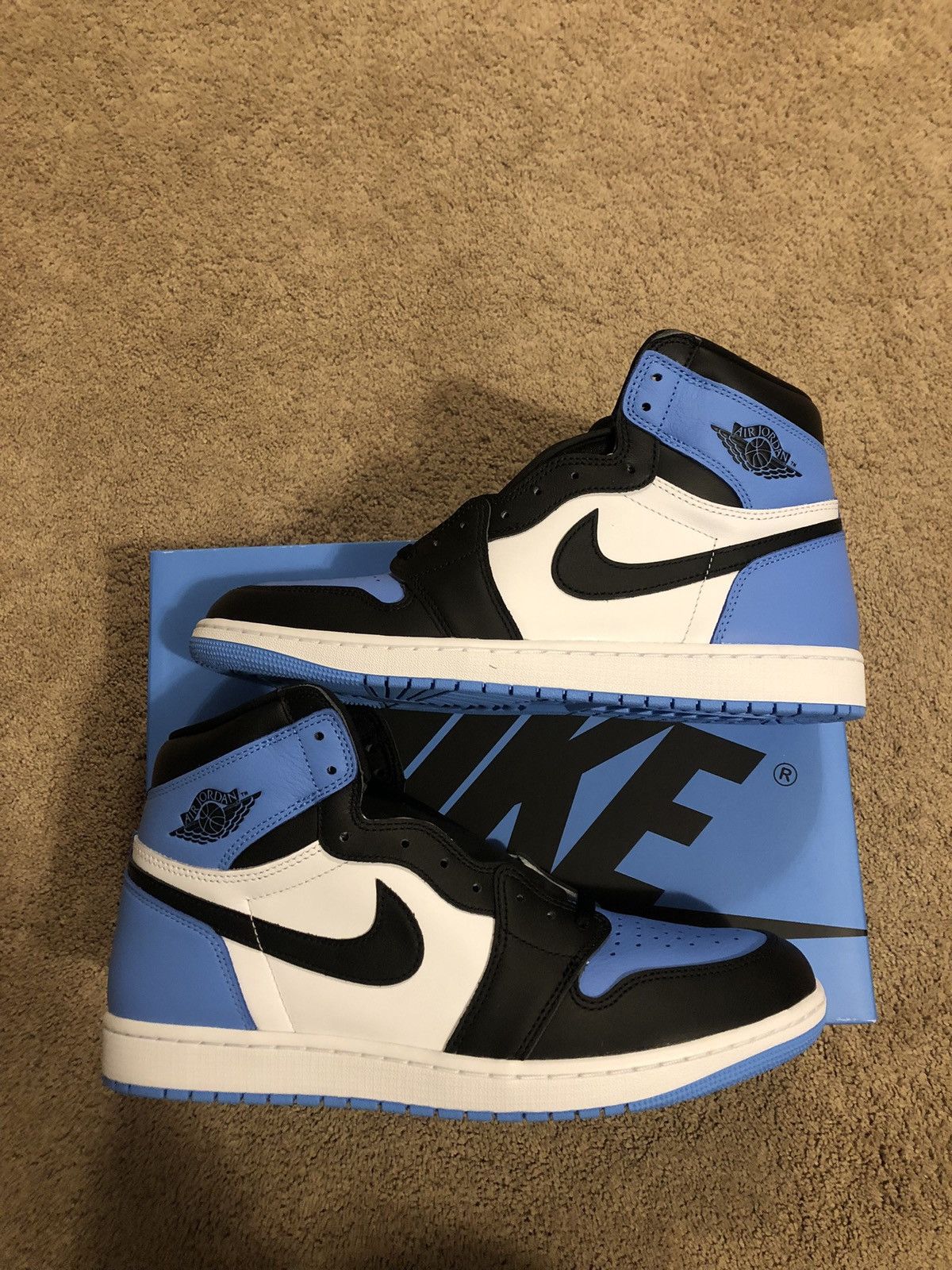image of Jordan Nike Air Jordan 1 High OG Unc Toe Shoes in Blue, Men's (Size 13)