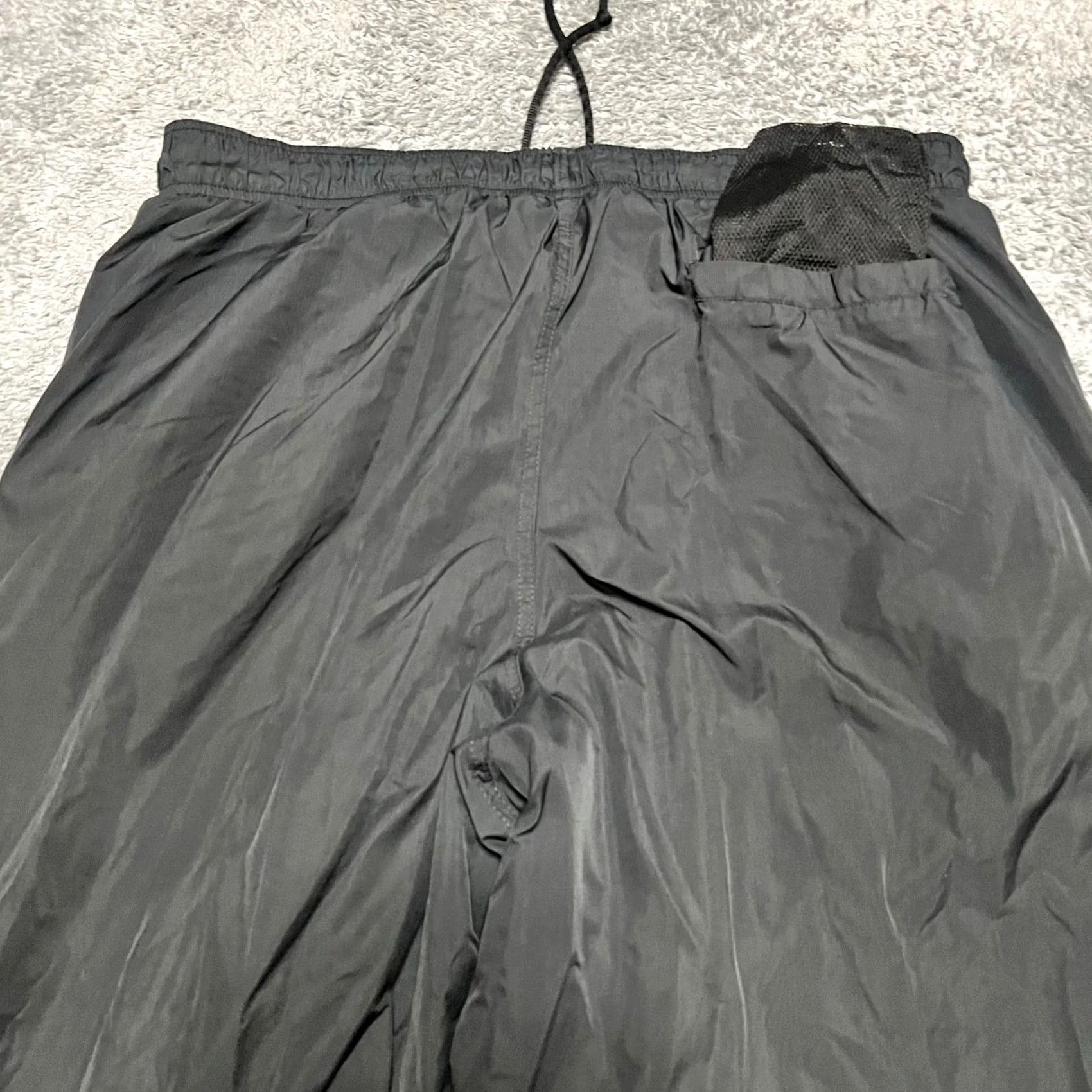 Nike VINTAGE 90s Nike Track Pants Mens XXL Black Cuffed Windbreaker Swoosh Ankle Zip Pants Mens Black 90s Nike Track Windsuit? Size 48R - 6 Thumbnail