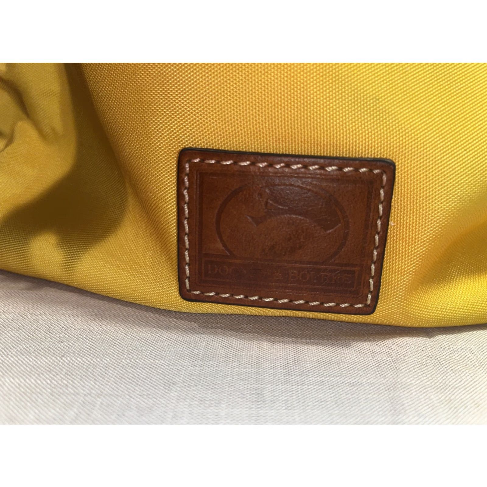 Dooney & Bourke Dooney & Bourke Yellow Canvas Hobo Style Handbag Leather Strap & Tassel Size ONE SIZE - 2 Thumbnail