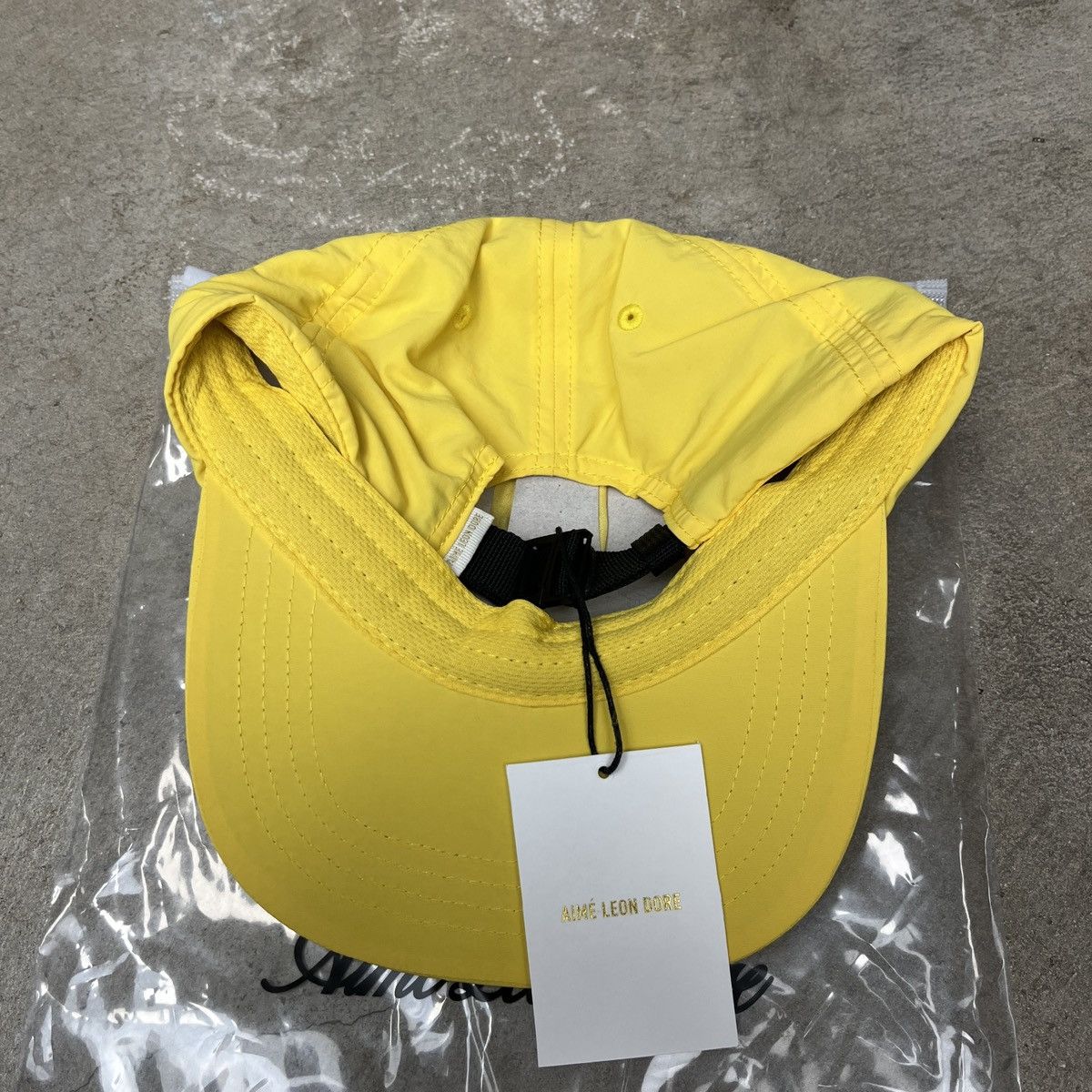Aime Leon Dore Aime Leon Dore Porsche Logo Hat Aspen Gold Size ONE SIZE - 2 Thumbnail