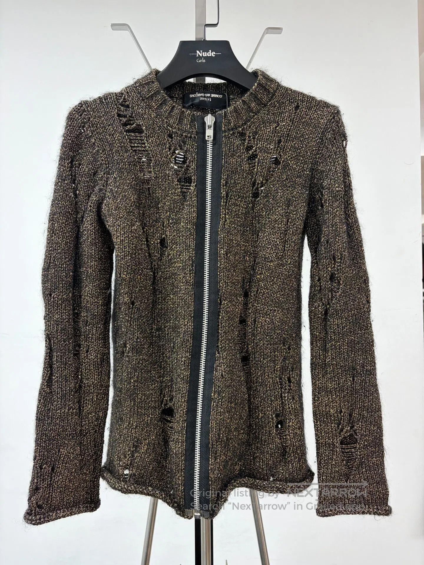 comme des garçons distressed knit sweater.