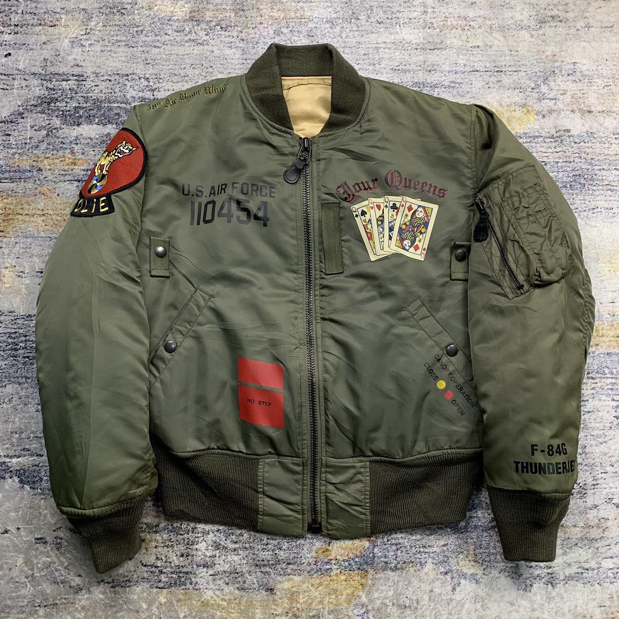 image of Vintage Avirex Four Queens Ma-1 Bomber Jacket in Olive Green, Men's (Size Small)