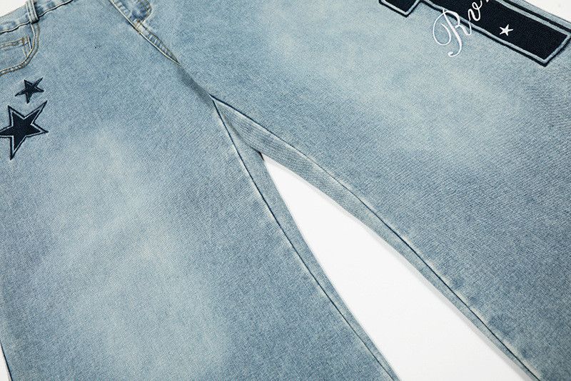 Vintage star embroidered distressed washed curved jeans