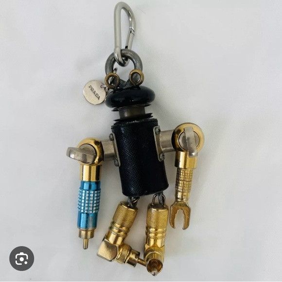 image of Prada Robot Charm in Gold Black, Women's